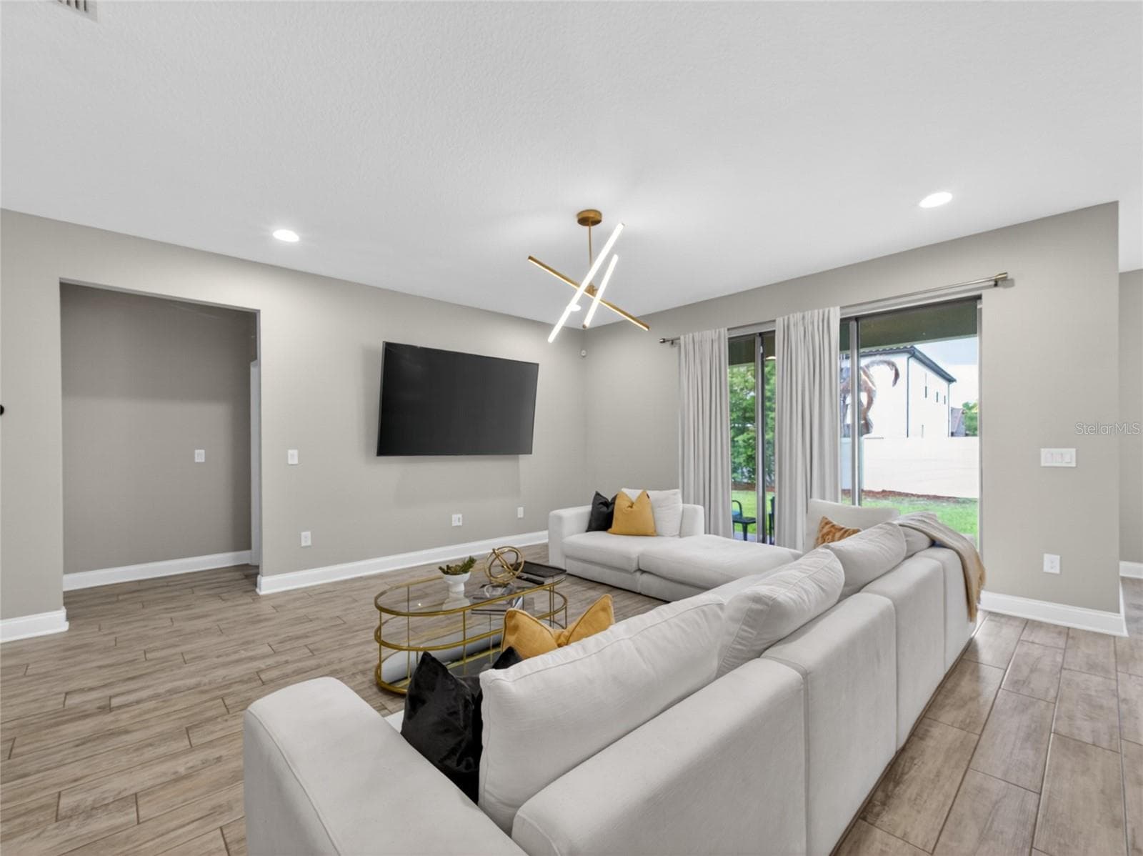 Great Room opens to the Lania and Back Yard - 11209 LEMON LAKE BLVD, ORLANDO