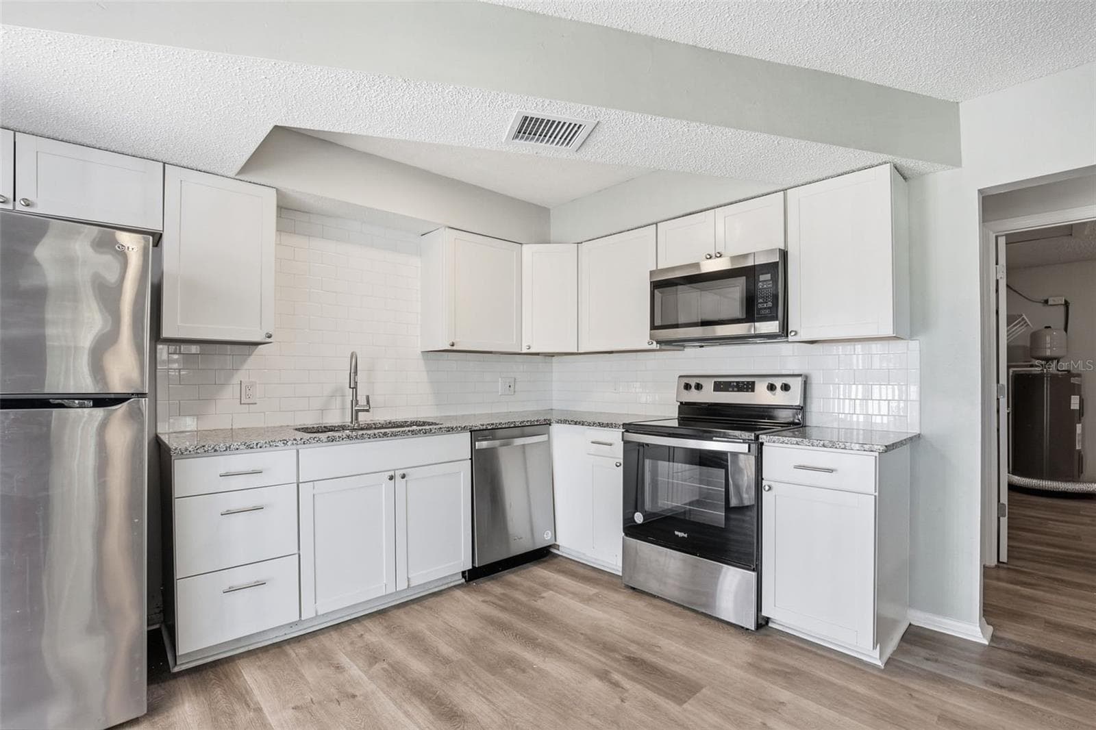 Single Family Residence at 728 E SPRUCE ST, TARPON SPRINGS, photo 14 of 35