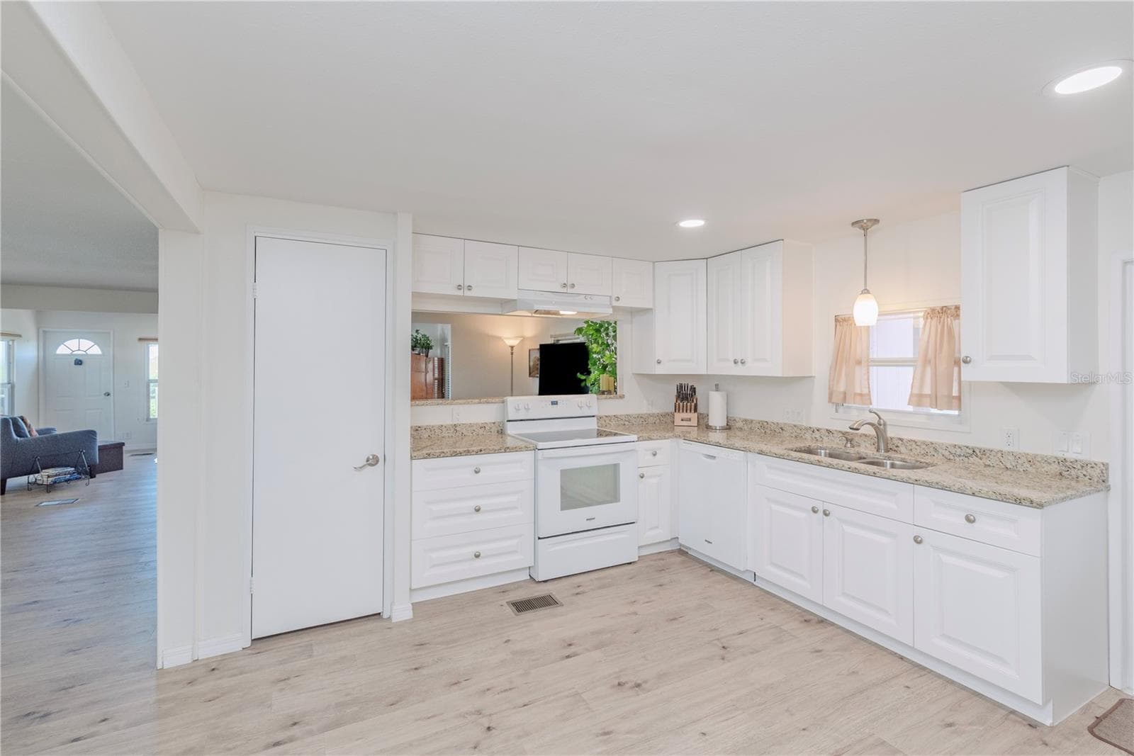 Kitchen with granite counters. - 4851 W GANDY BLVD #23C, TAMPA