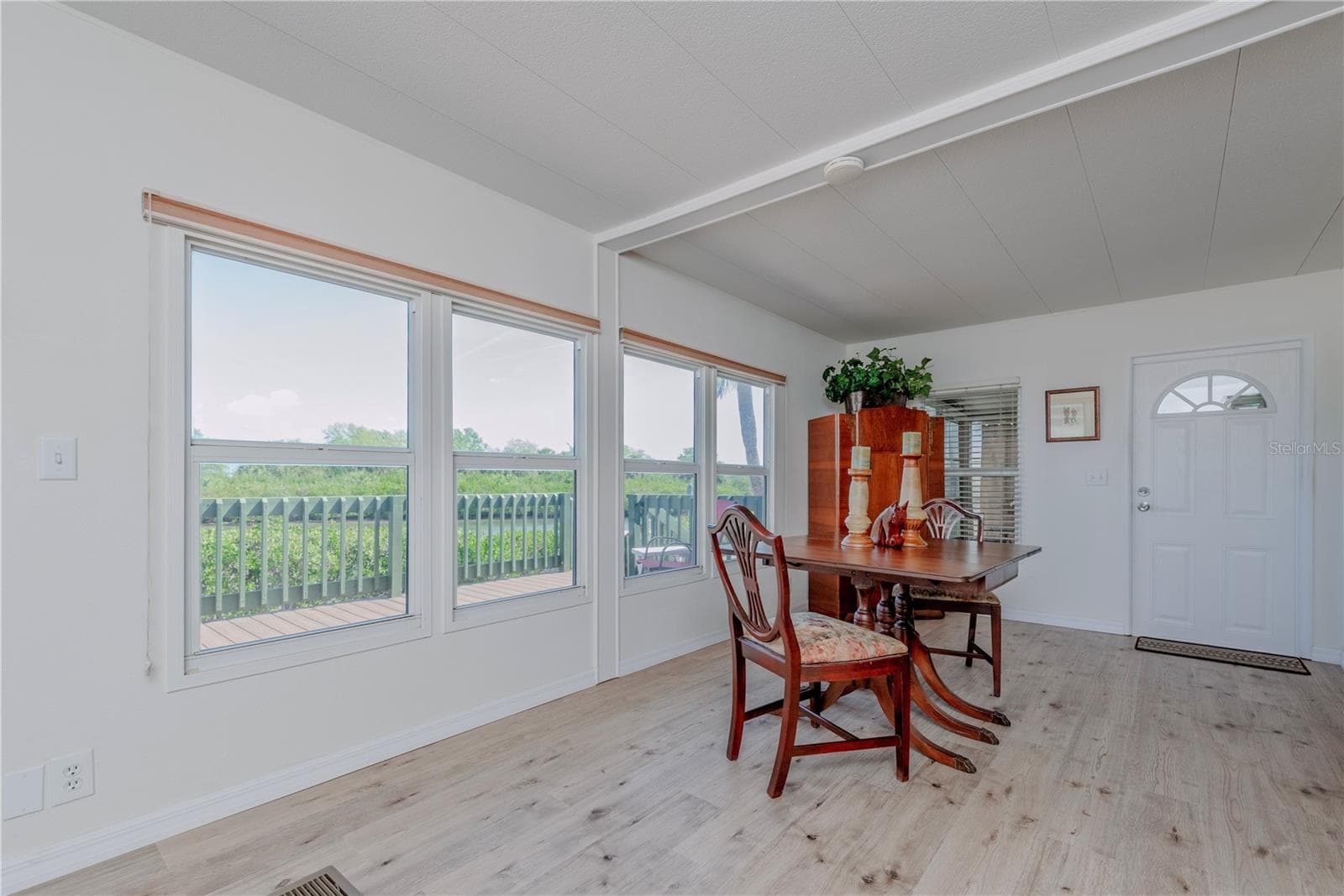 Access to the screened porch. - 4851 W GANDY BLVD #23C, TAMPA
