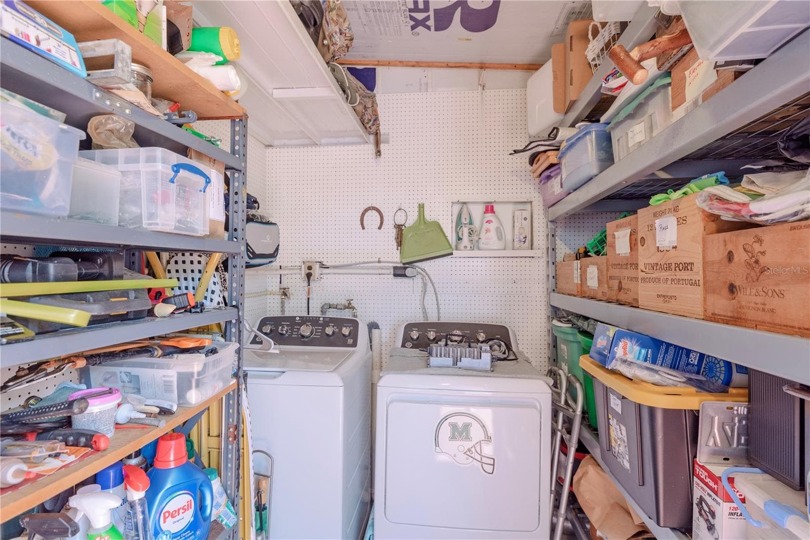 Laundry room with storage. - 4851 W GANDY BLVD #23C, TAMPA