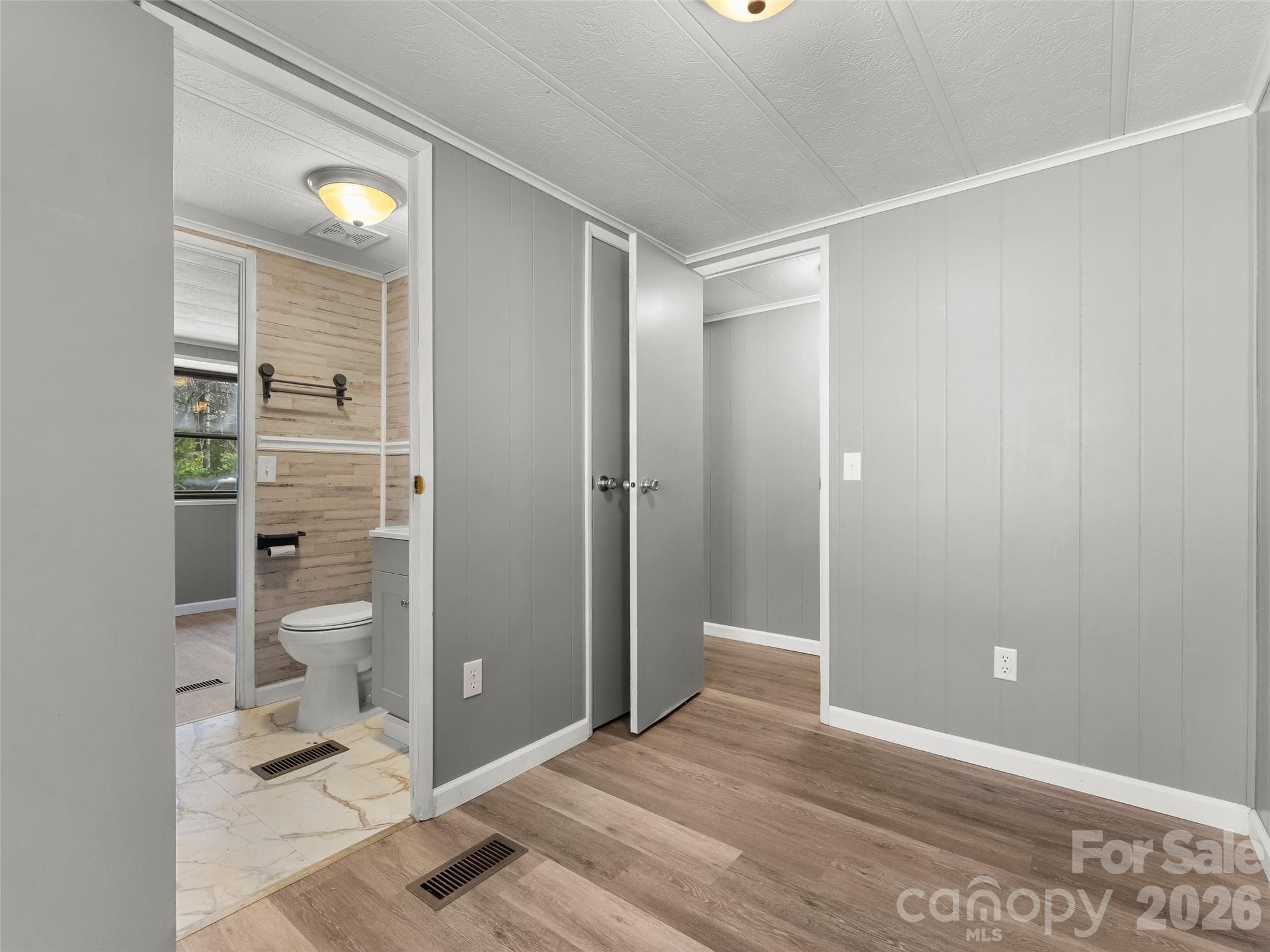 Shot of the Jack in Jill style connection from Small Room (has closet) through to second Bedroom - 40 Morning Dove Lane, Flat Rock