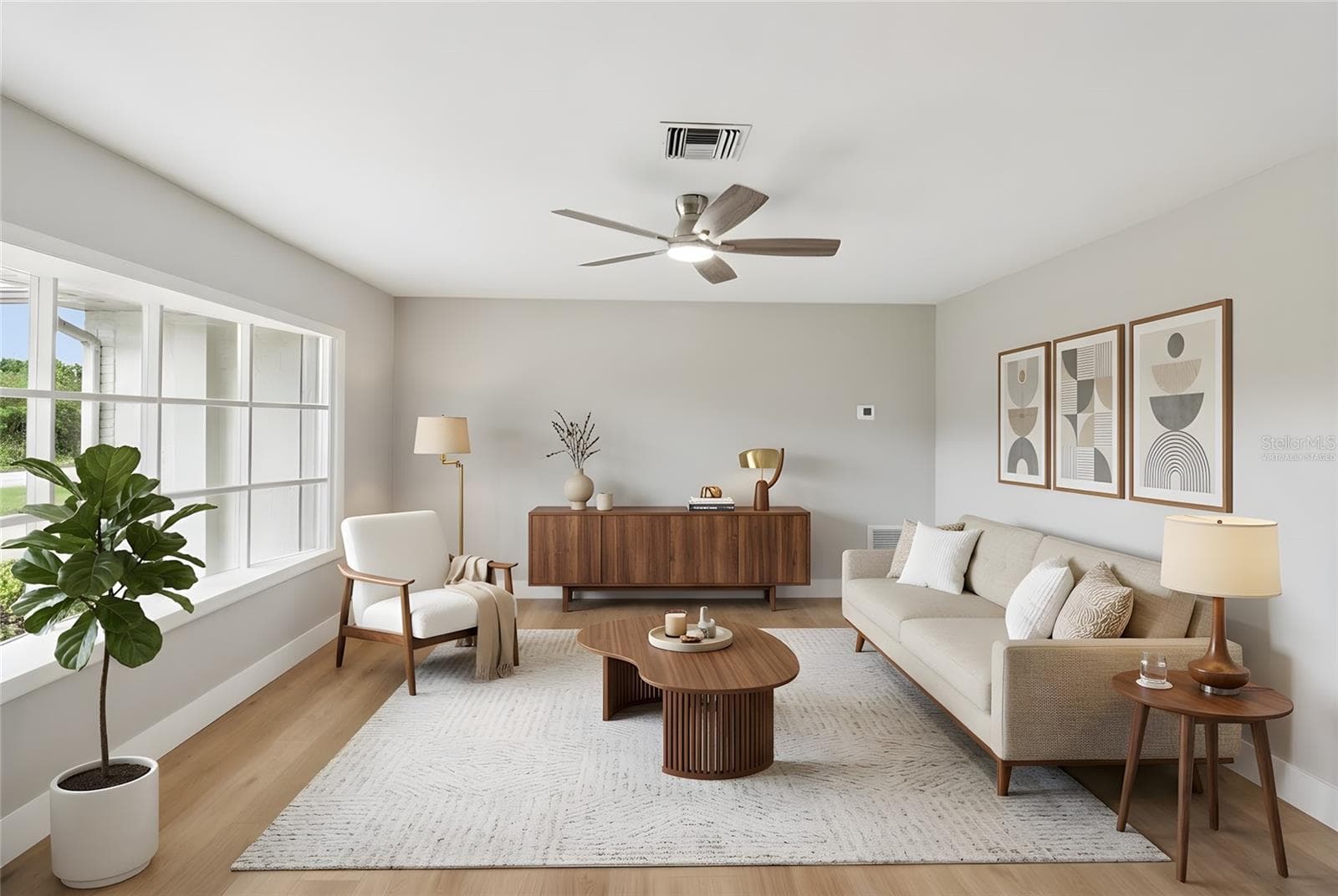 Living Room. Virtually Staged. - 1412 DIGARMO TER, DELTONA
