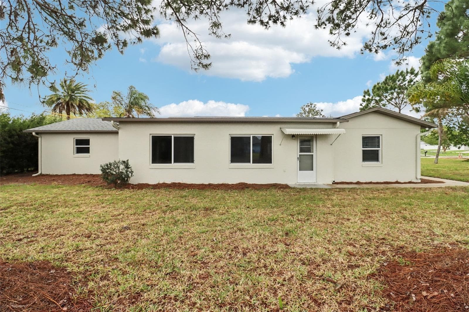 Backyard. - 1412 DIGARMO TER, DELTONA