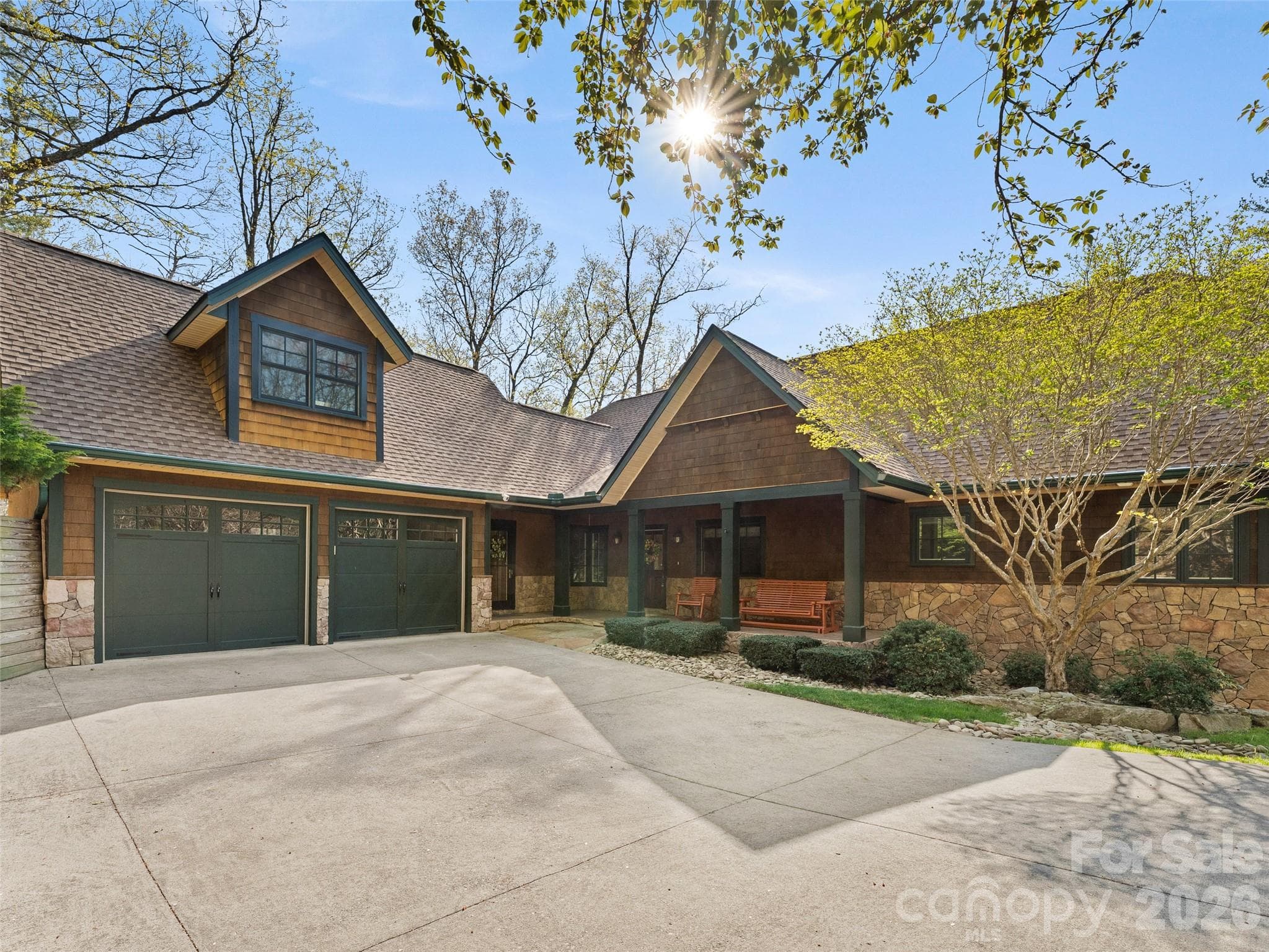 This home features a 2-car attached garage, and flat driveway parking. - 5 Stegall Lane, Asheville
