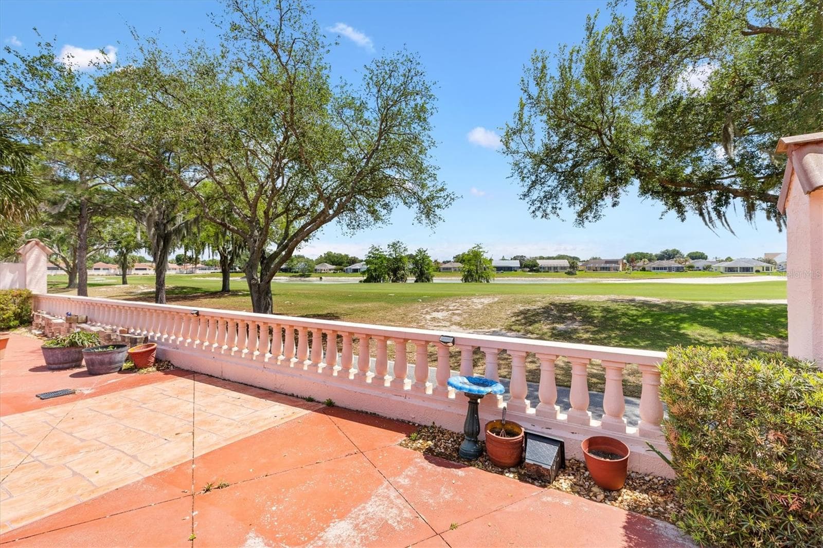 Courtyard with View of Golf Course - 1314 SANTA ROSA CT, LADY LAKE