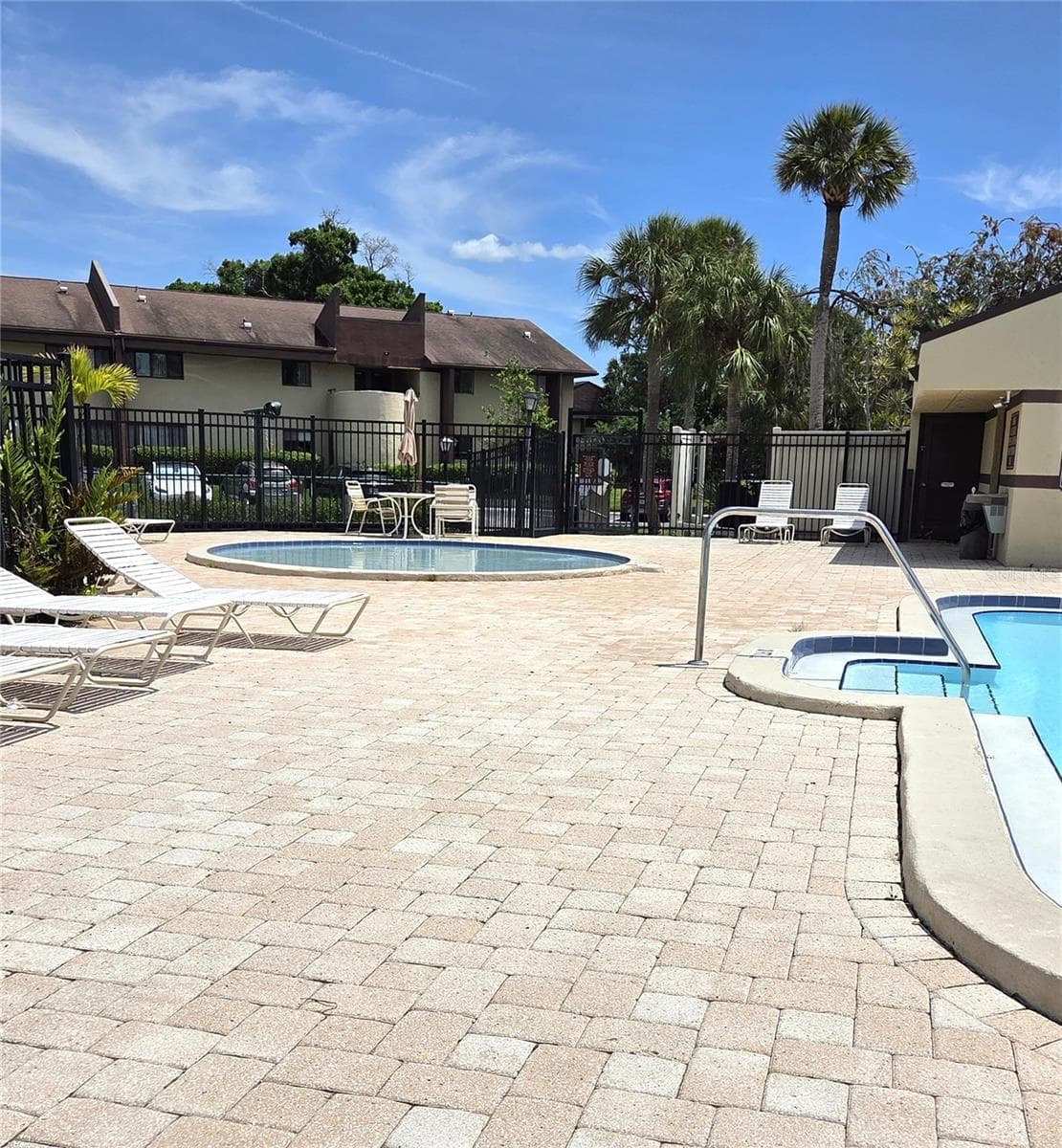 Wading pool and pool area. - 10755 VILLAGE CLUB CIR N #101, ST PETERSBURG
