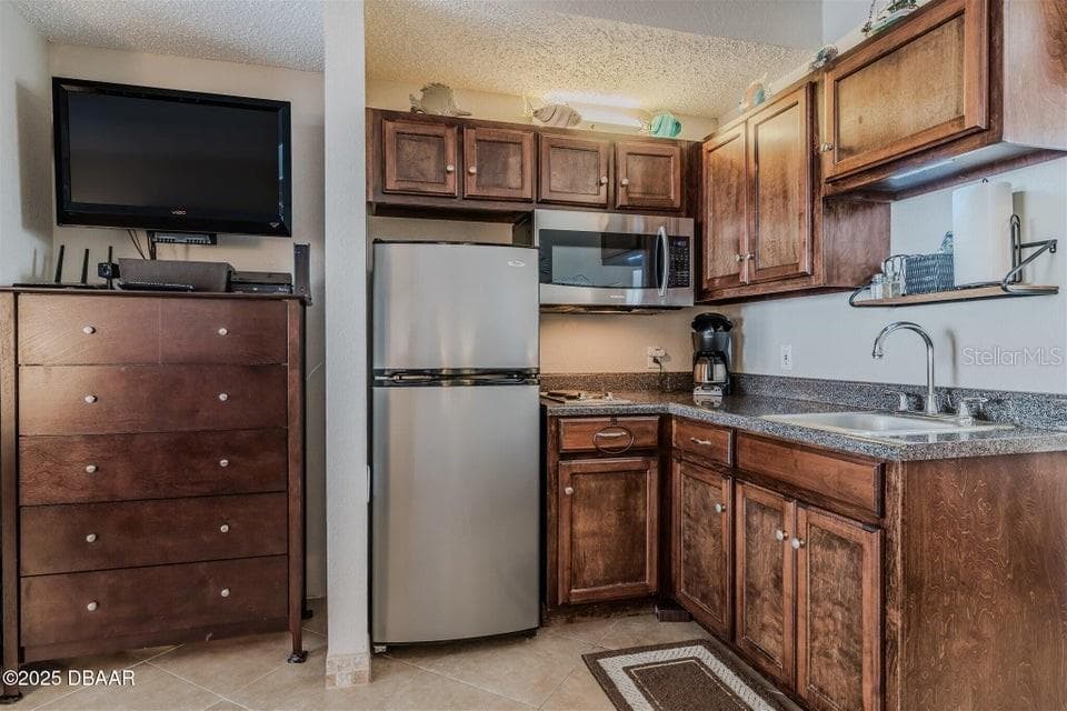 Condominium at 935 S ATLANTIC AVE #128, DAYTONA BEACH, photo 7 of 13