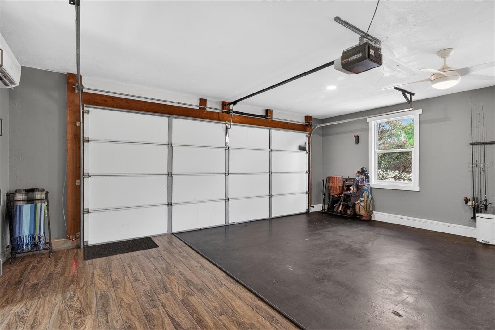 Garage space with insulated door down - 9406 SW 78TH CT, GAINESVILLE
