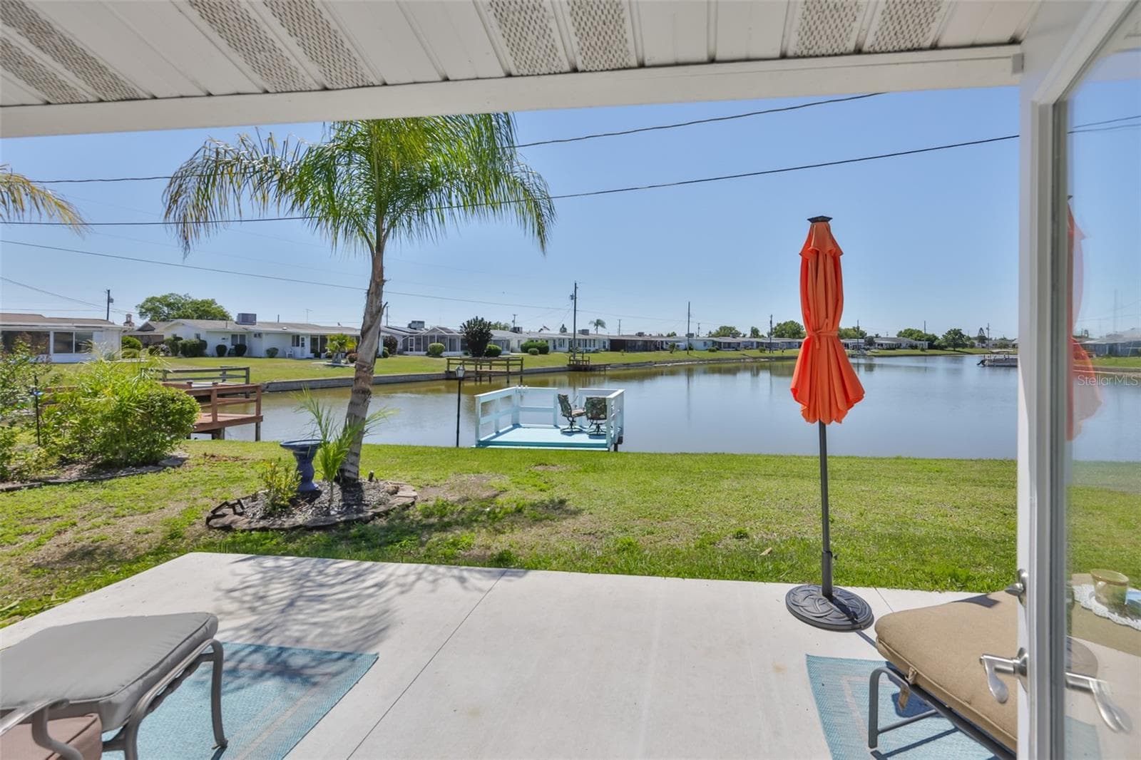 Lovely South Lake, Private Dock, Boatable, Maintenance Free, Sewer Pipes Lined, Lawn Irrigation Comes From the Lake - 1704 DANBURY DR, SUN CITY CENTER