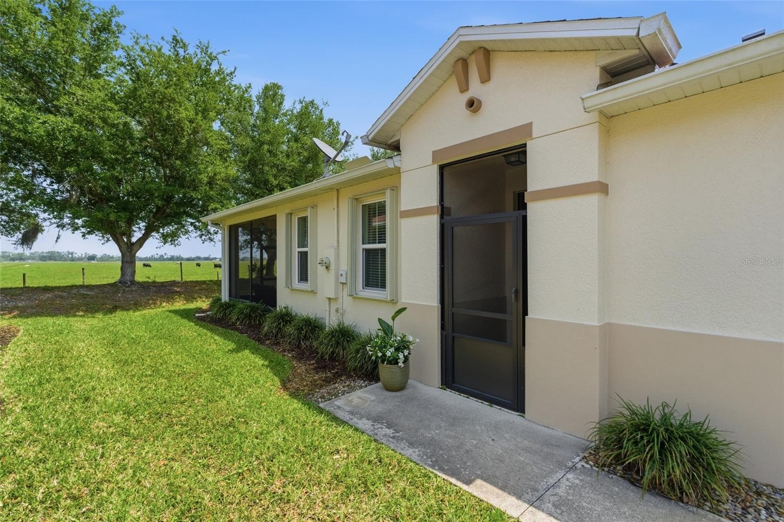 Screened front entry - 8834 TUSCANY ISLES DR, PUNTA GORDA
