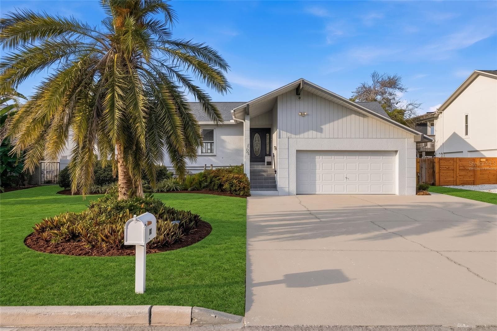 Front of home virtually staged - 155 1ST ST W, TIERRA VERDE