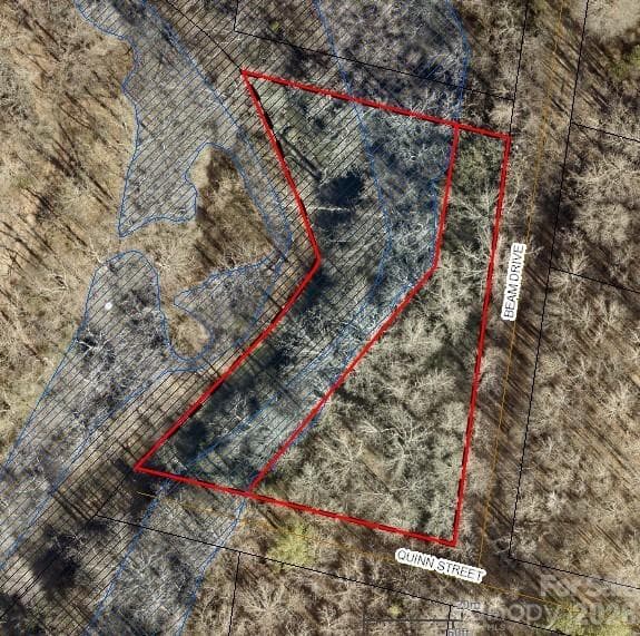 Per the flood map, there is almost half an acre that's not in the flood plain. - Shelby