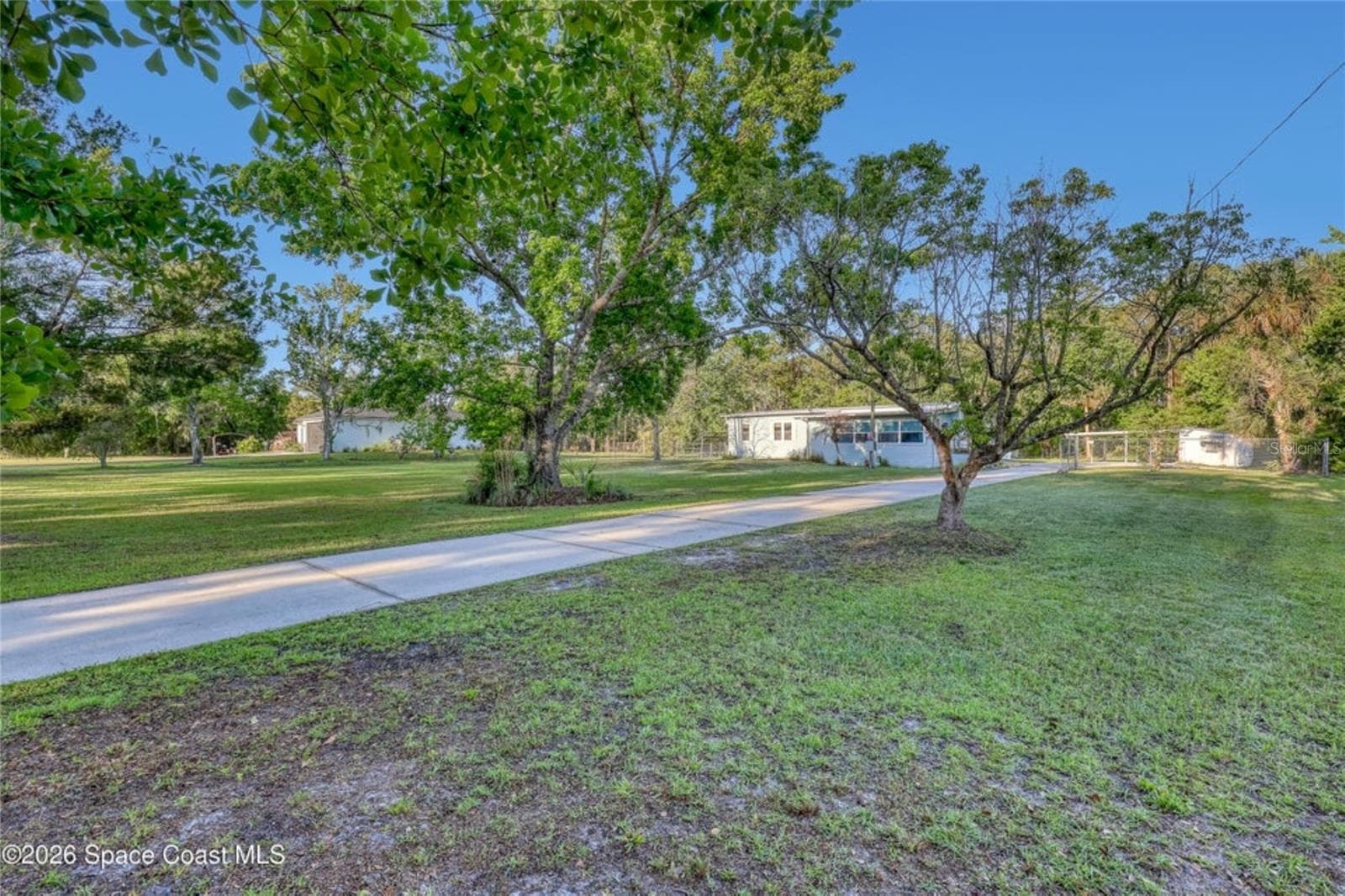 Manufactured Home at 2540 TUSCANY DR, MIMS, photo 6 of 50