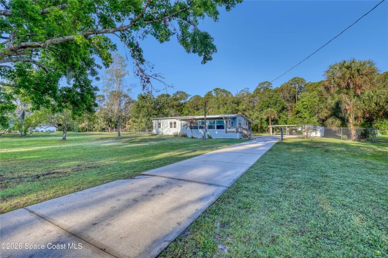 Manufactured Home at 2540 TUSCANY DR, MIMS, photo 7 of 50