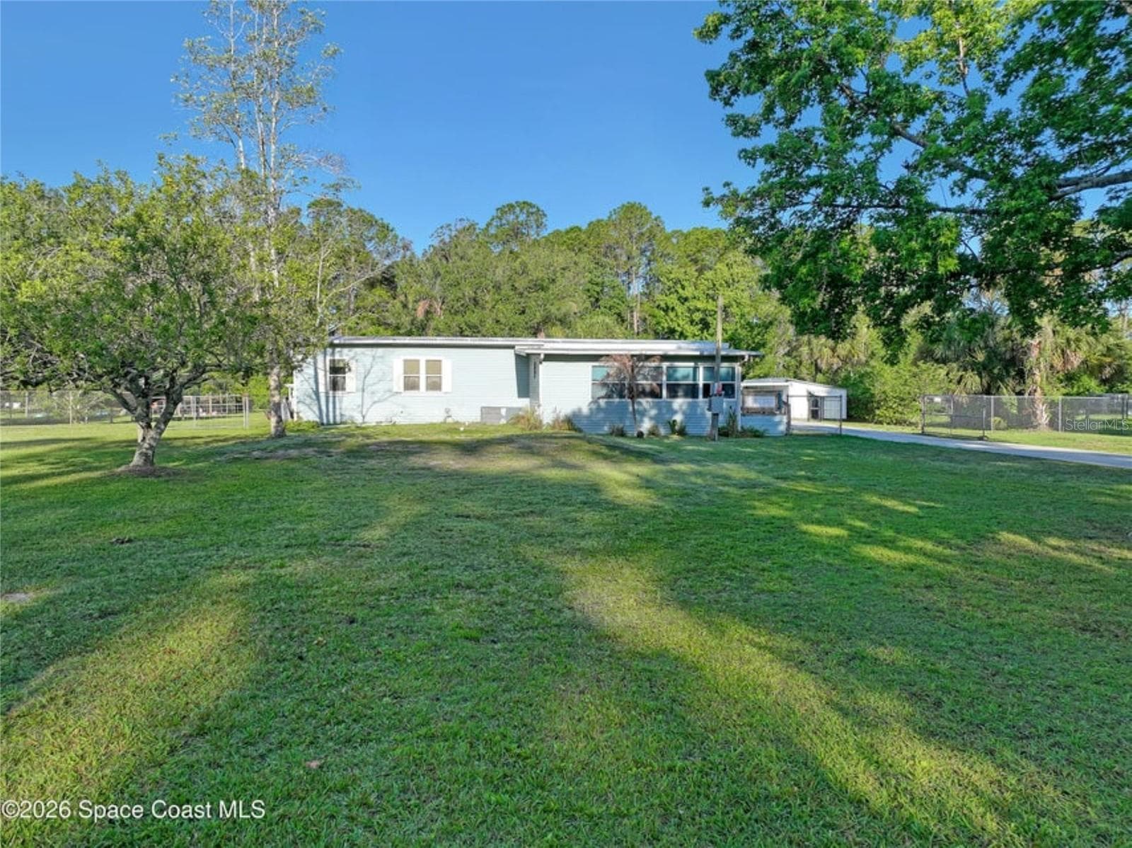 Manufactured Home at 2540 TUSCANY DR, MIMS, photo 45 of 50