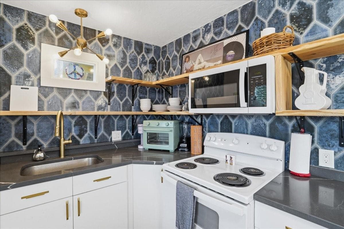 Triplex at 130 86TH TER, TREASURE ISLAND, photo 32 of 90