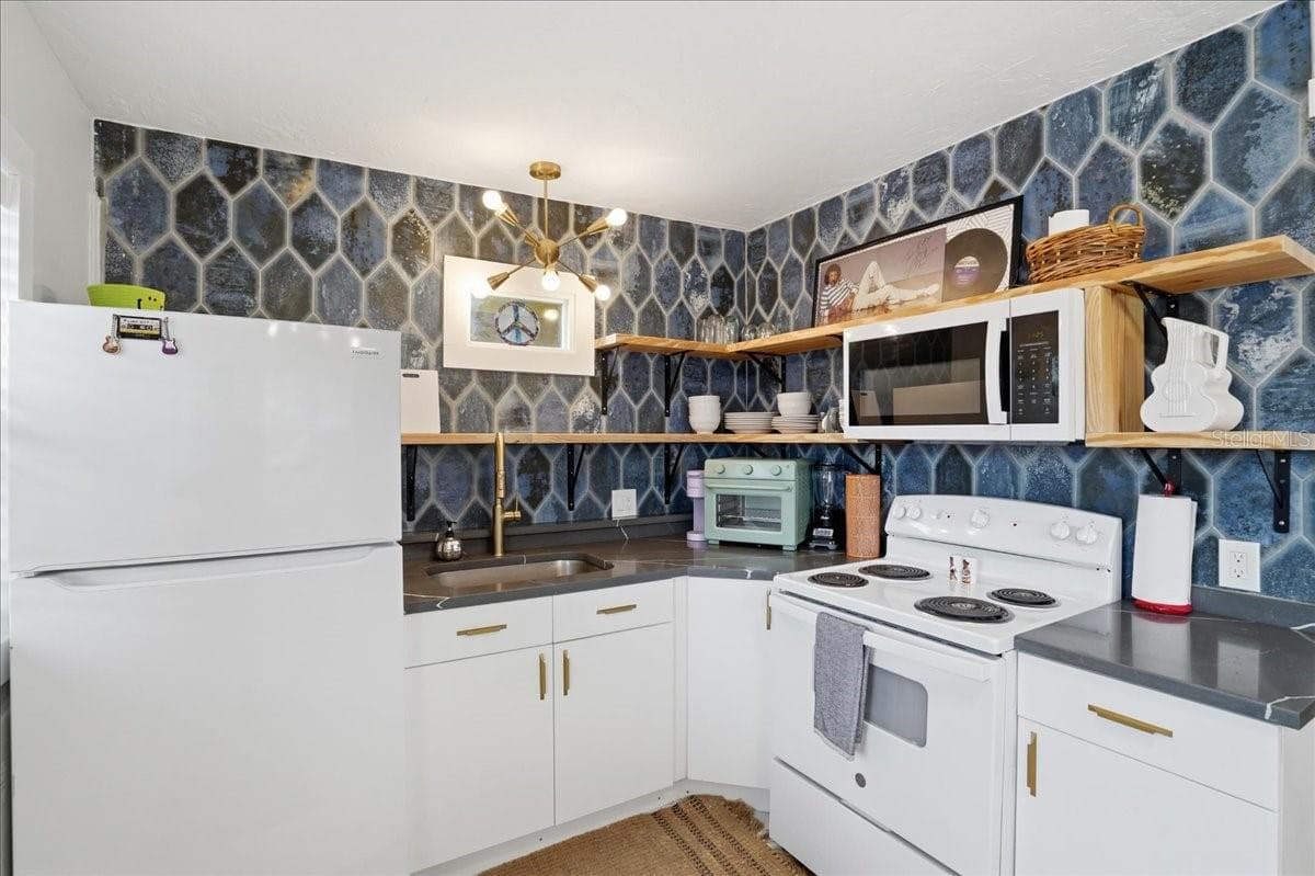 Triplex at 130 86TH TER, TREASURE ISLAND, photo 54 of 90