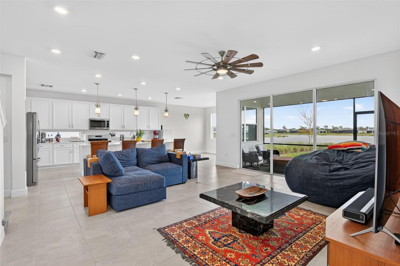 Open living space combined with spacious kitchen - 42581 ATLAS DR, PUNTA GORDA