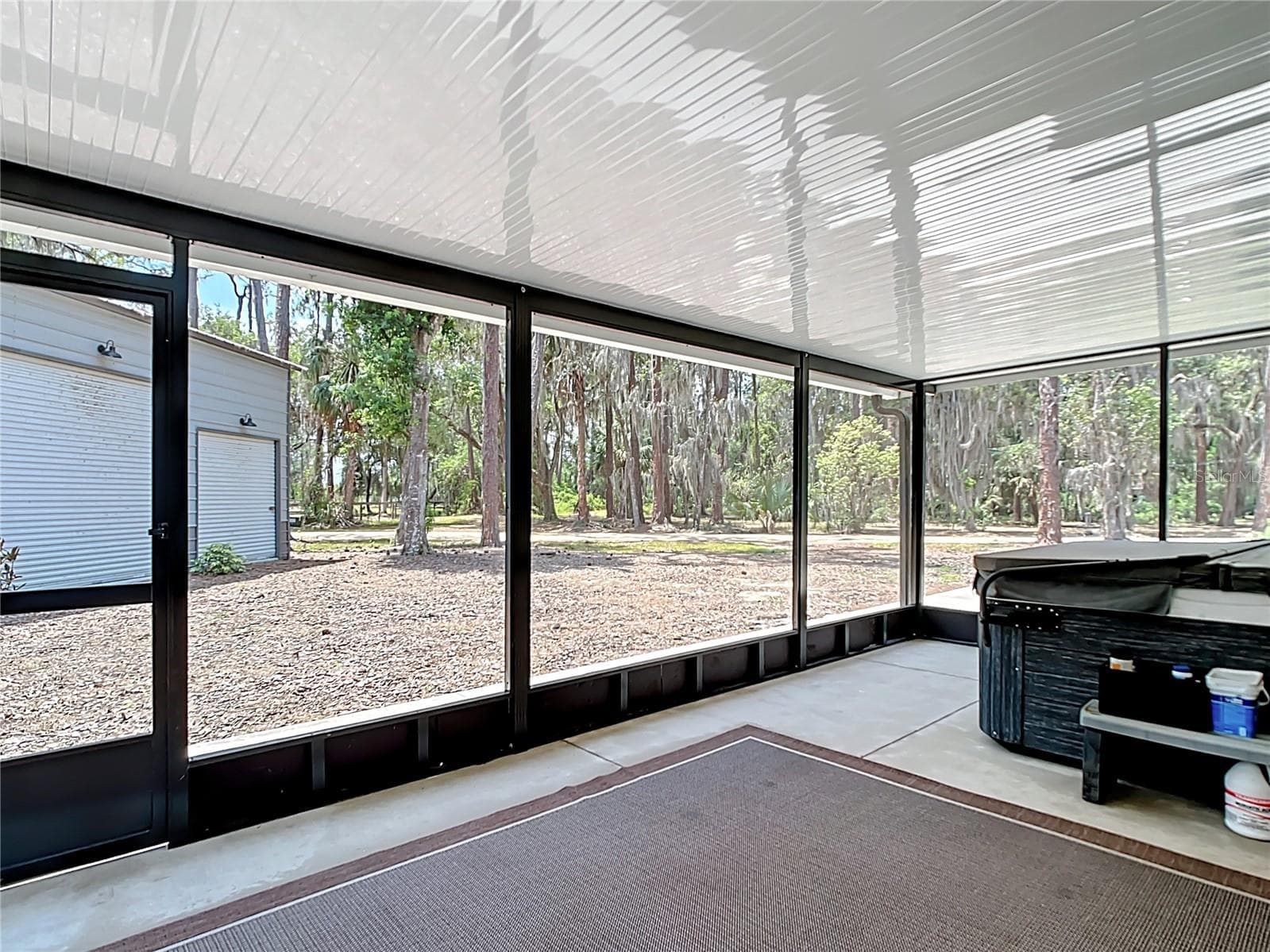 Covered screened patio - 7374 CIRCLE DR, LADY LAKE