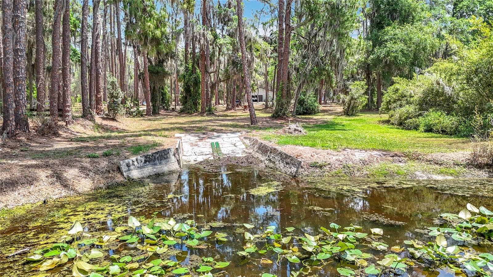 Boat ramp (sellers garage can be seen in rear of photo) - 7374 CIRCLE DR, LADY LAKE