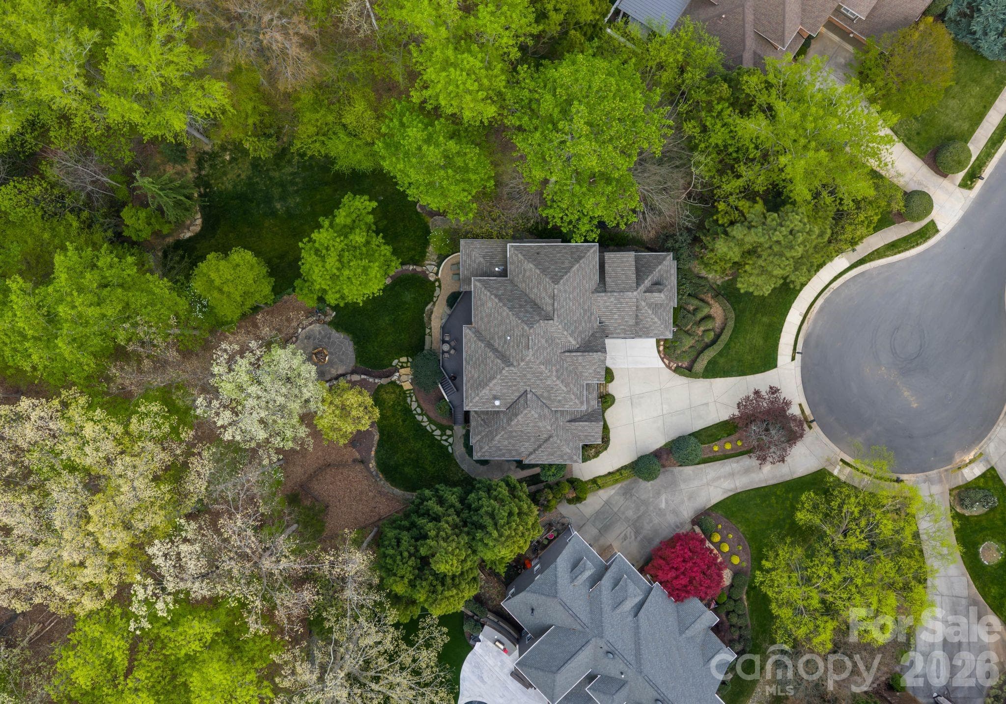 Wooded lot with open space carved out - 1514 Elmsford Lane, Matthews