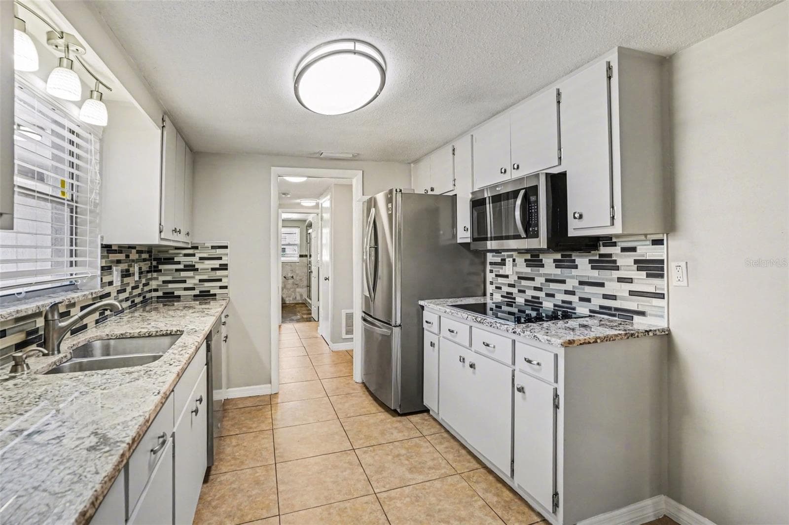 Single Family Residence at 8006 MIMOSA DR, PORT RICHEY, photo 7 of 18
