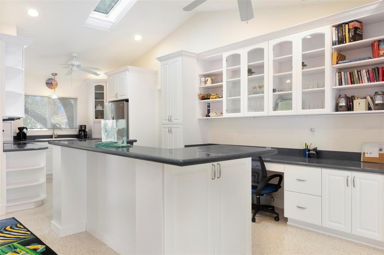 Beautiful solid surface countertops & the additional barstool island can accommodate many guests! - 11855 4TH ST E, TREASURE ISLAND