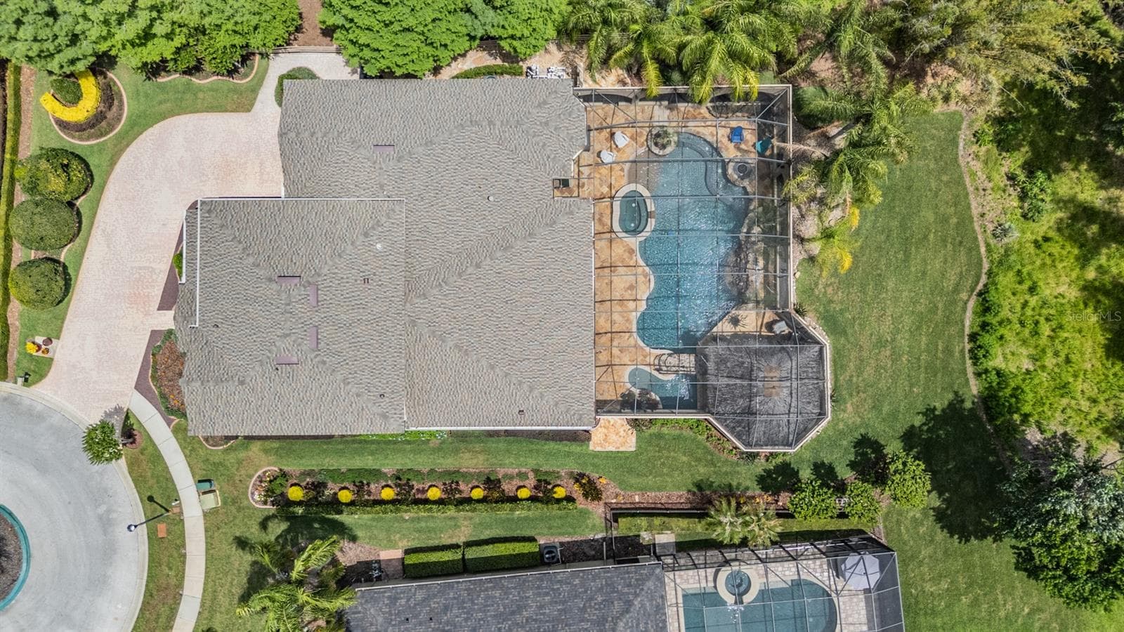 This home's Private Oasis with it's own fountains, waterfalls, spa,Tiki Hut and beach entry pool - 21246 QUIET HAVEN CT, LAND O LAKES