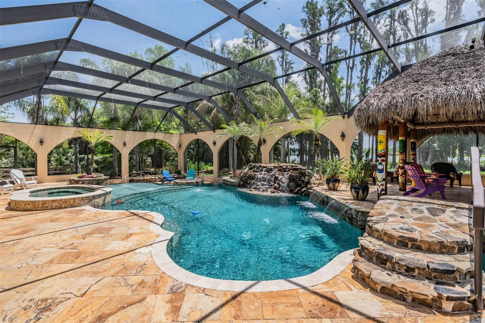 Private Pool Oasis with it's own fountains, waterfalls, spa, Tiki Hut and beach entry pool - 21246 QUIET HAVEN CT, LAND O LAKES