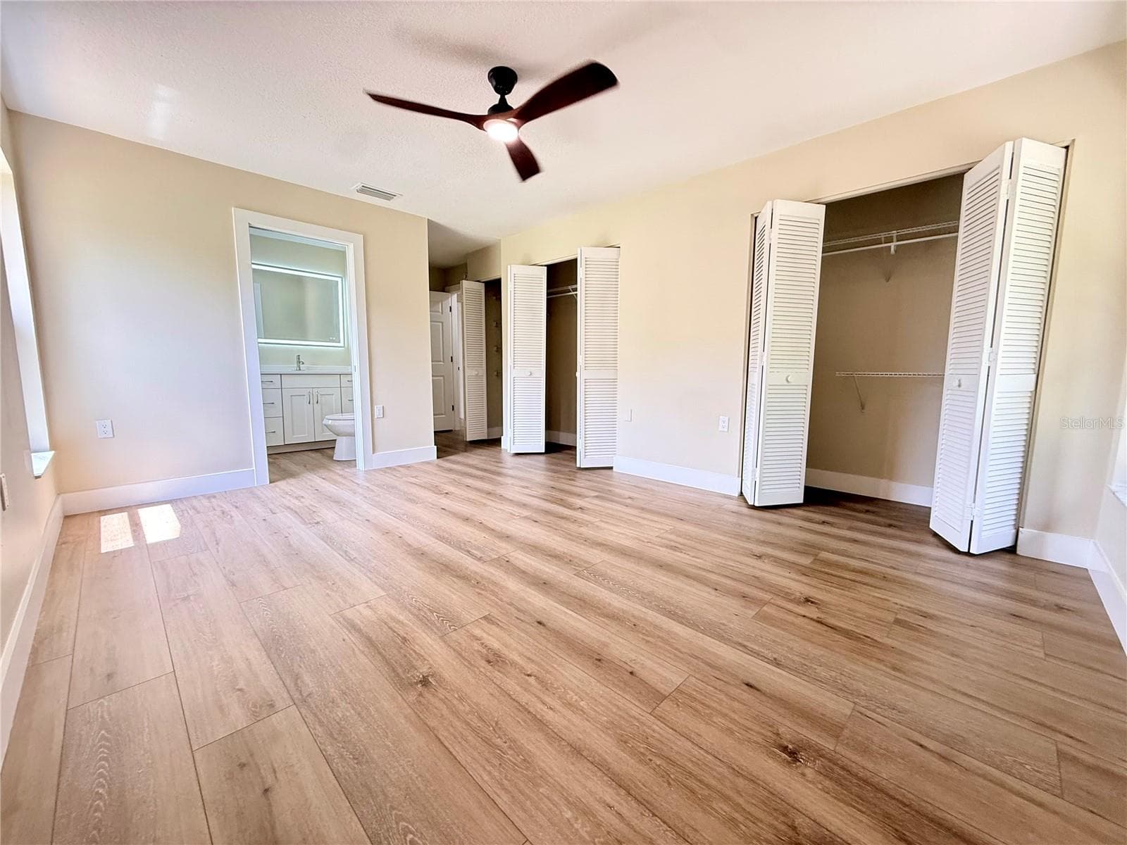 Bright & Roomy Primary Bedroom - 10501 HARDWOOD CT, PORT RICHEY