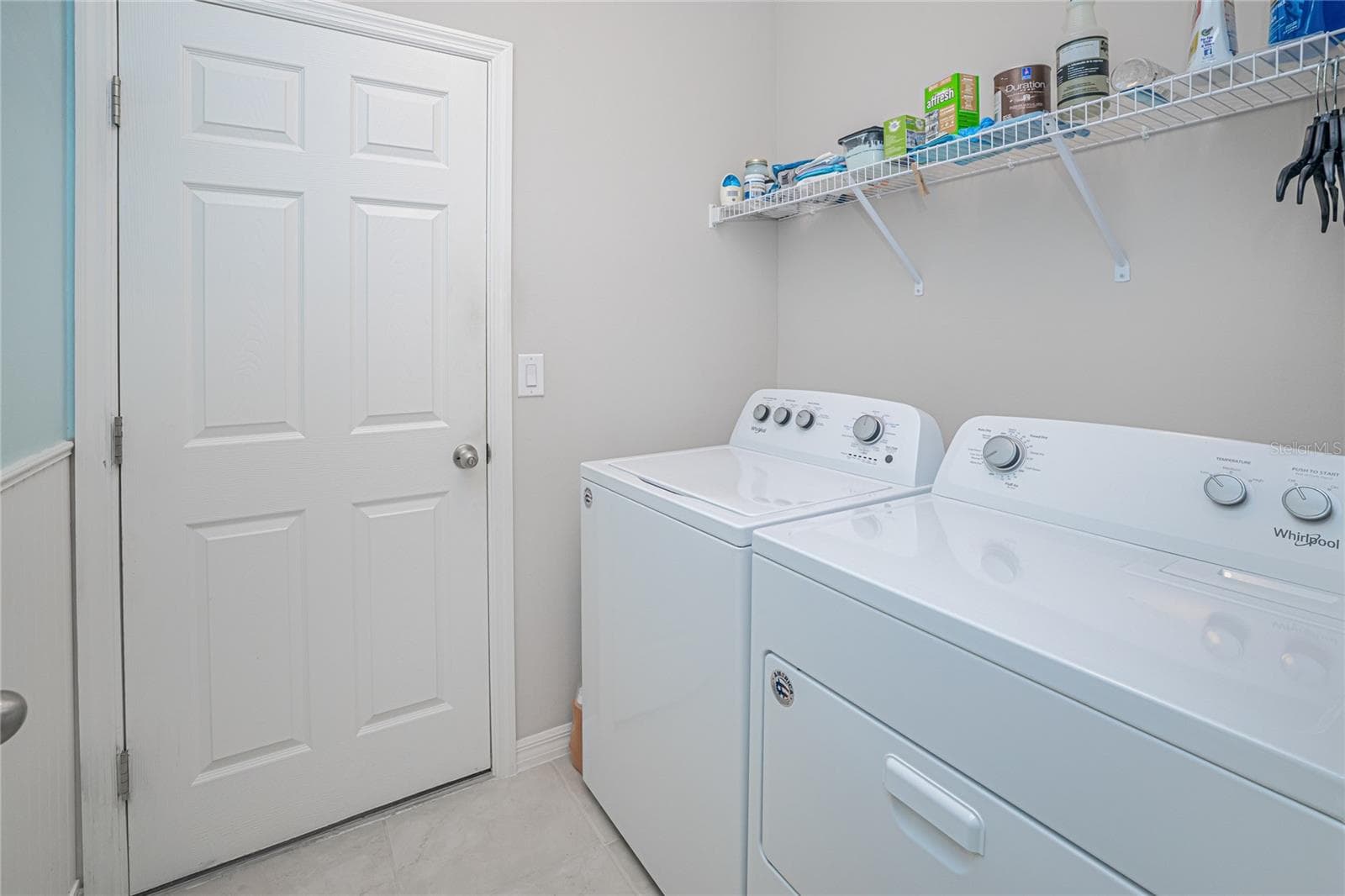 LAUNDRY ROOM/DOOR TO GARAGE - 25292 E LENOX CIR, PUNTA GORDA