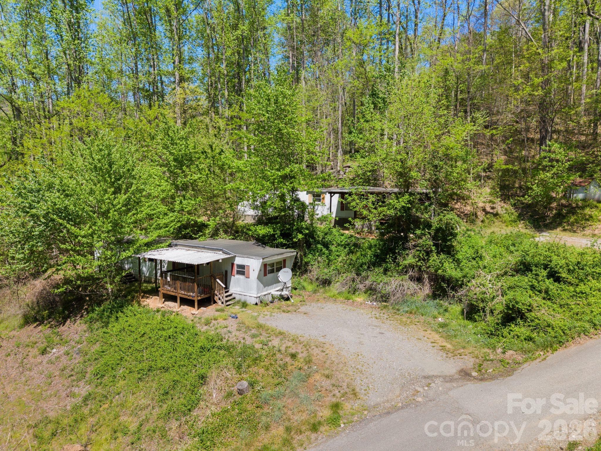 Upper units on the left side of driveway. Long term tenants in place - 290 Hookers Gap Road, Candler