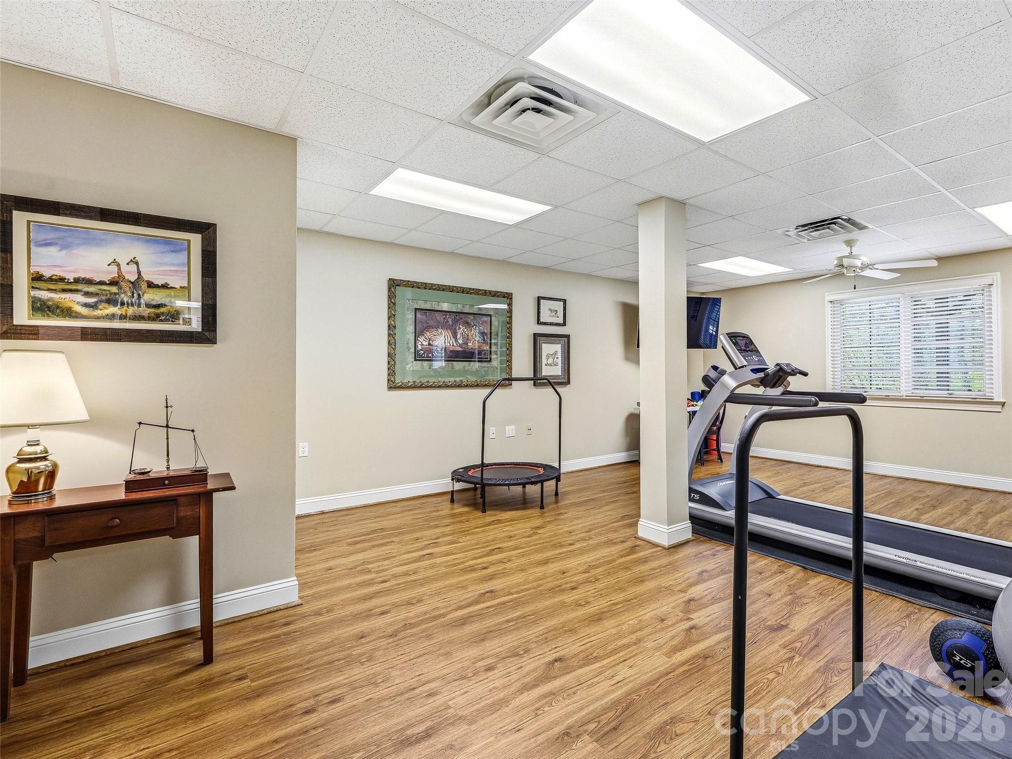This large basement bonus room currently used as an exercise room has a closet and windows and can be used as a 5th bedroom. - 33 Tiverton Lane, Asheville