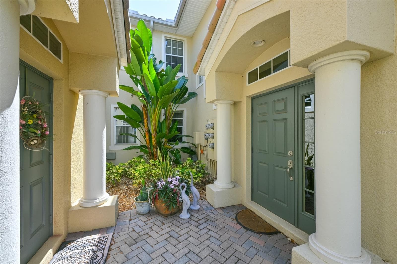 Courtyard entry - 1330 EMERALD DUNES DR, SUN CITY CENTER