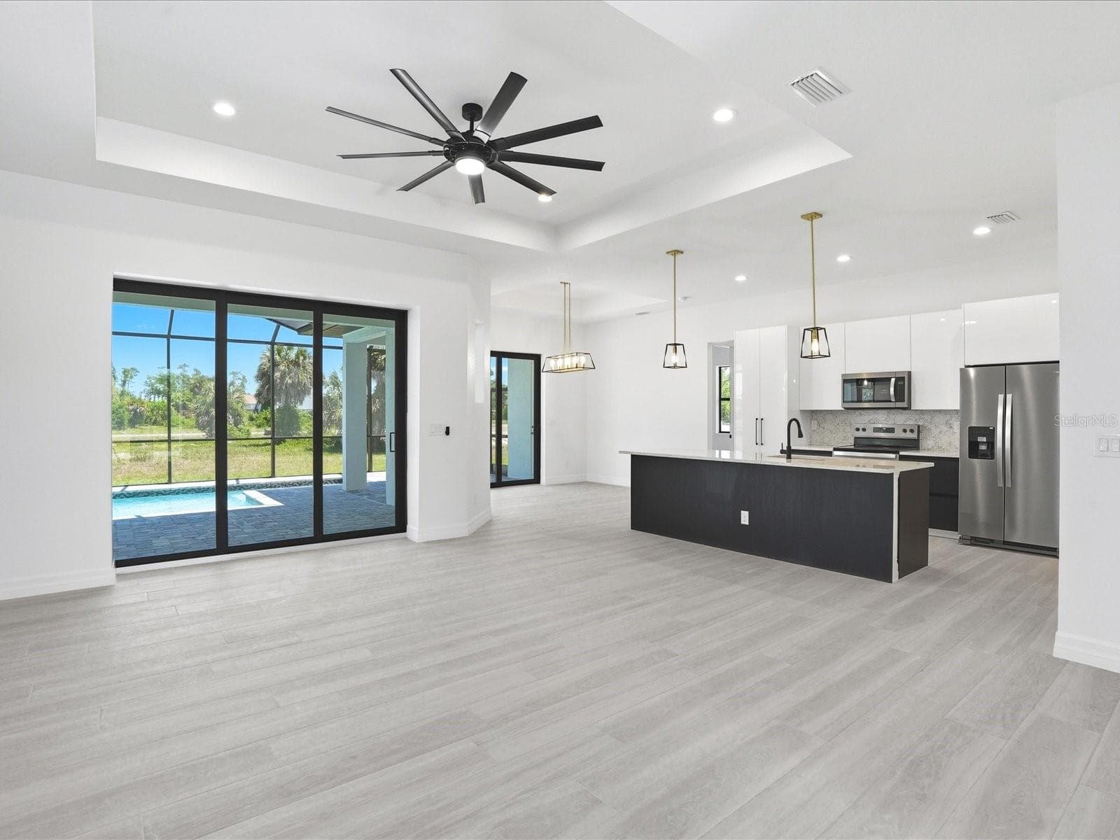 Living Room and Open Kitchen View - 72 TEE VIEW RD, ROTONDA WEST