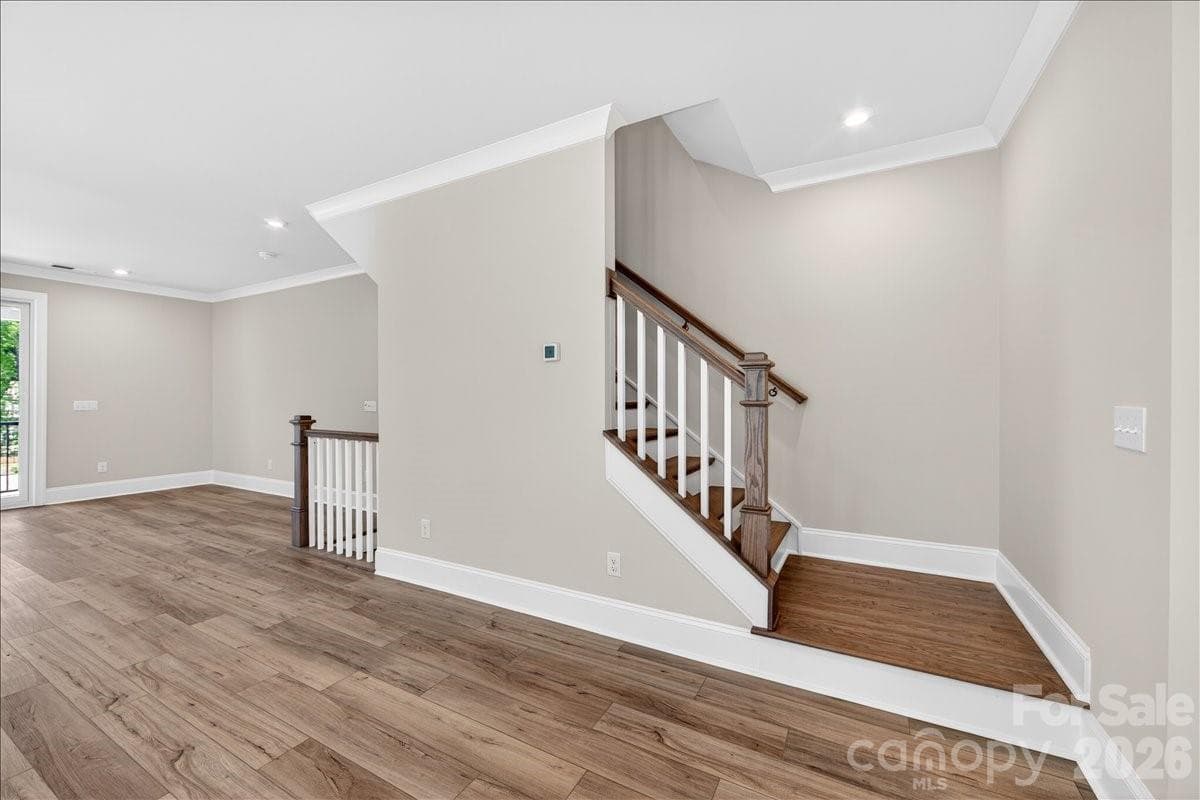 Oak box stairs with open rails - 12023 Elsa Lane, Charlotte