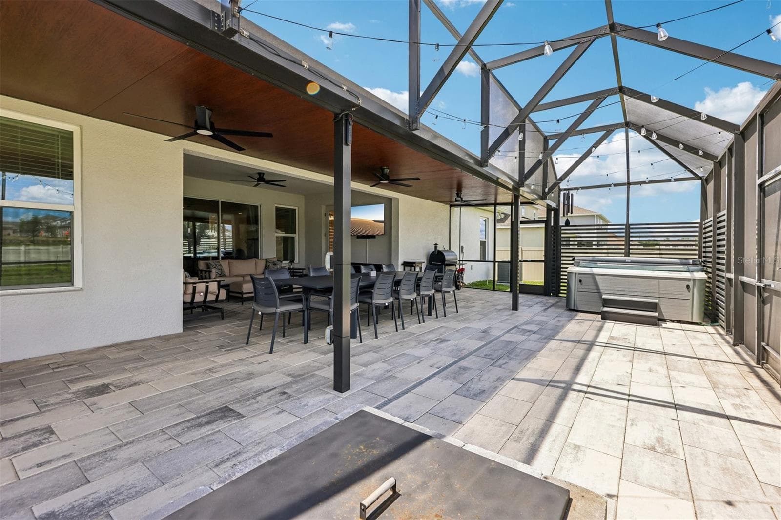 Complete with a hot tub and fire pit. - 6100 SIERRA CROWN ST, MOUNT DORA