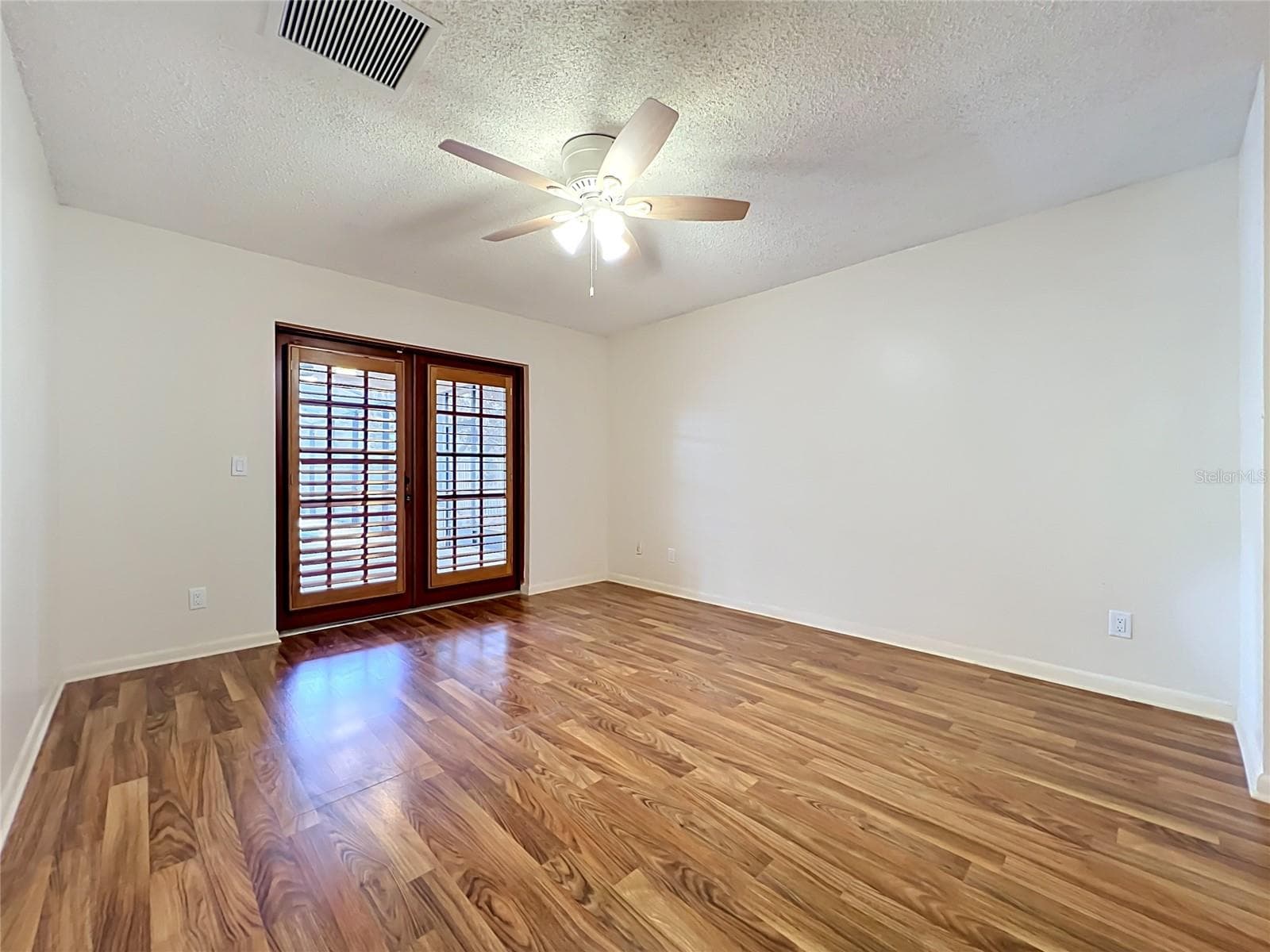 Primary Suite with french doors to lanai - 105 CEDAR OAK TRL, LONGWOOD