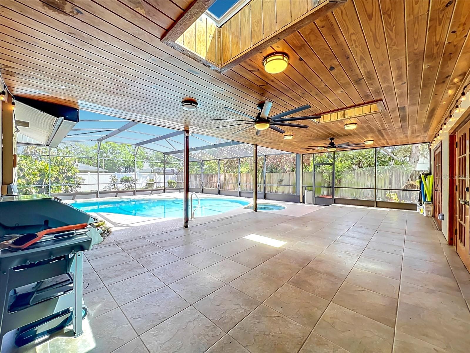 Stunning woodwork and huge paddle fans on Lanai - 105 CEDAR OAK TRL, LONGWOOD