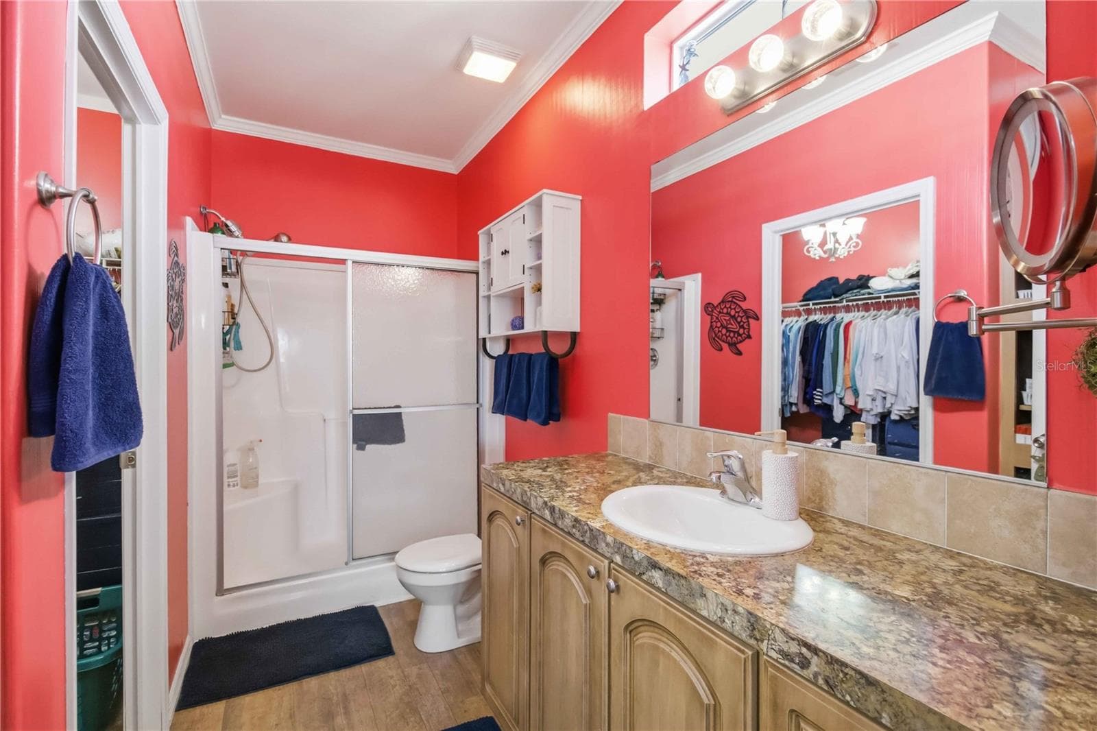 Cheery Primary bathroom. - 915 50TH AVE W, BRADENTON
