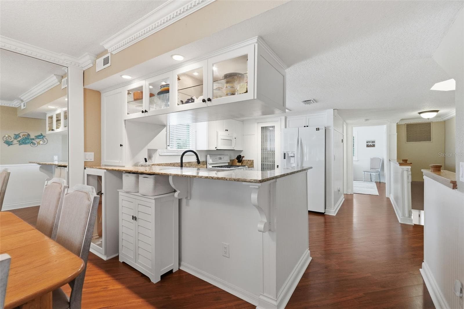 Built in glass cabinets, glass wine cabinet and upper cabinet. - 14837 SEMINOLE TRL, SEMINOLE
