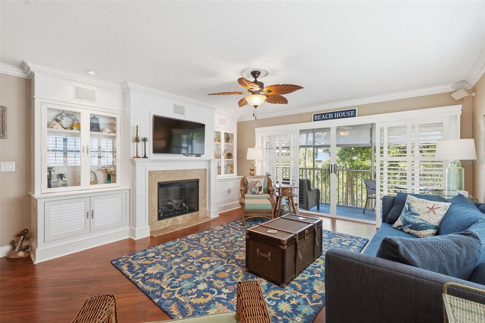 Gas Fireplace with built-in Display cabinets. Crown molding throughout the home. - 14837 SEMINOLE TRL, SEMINOLE