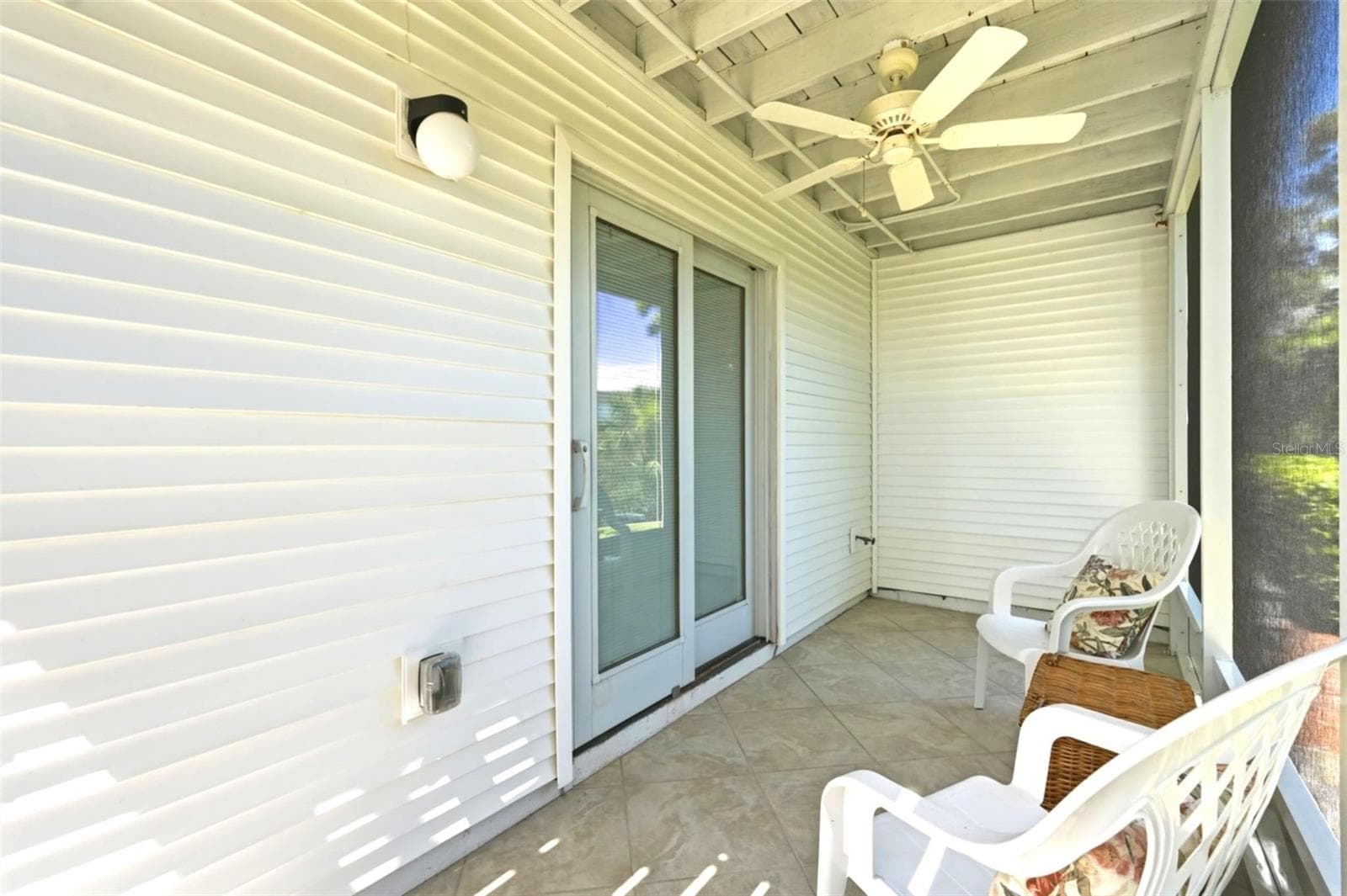 1st Floor screened patio with ceiling fan. - 14837 SEMINOLE TRL, SEMINOLE