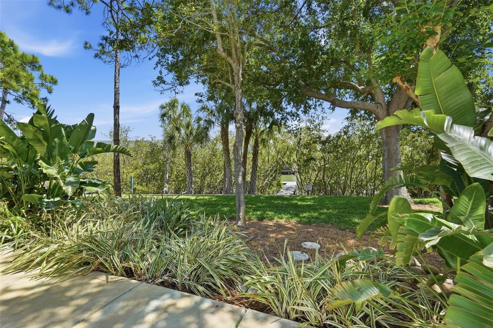 Tranquil Green space behind the townhome. - 14837 SEMINOLE TRL, SEMINOLE