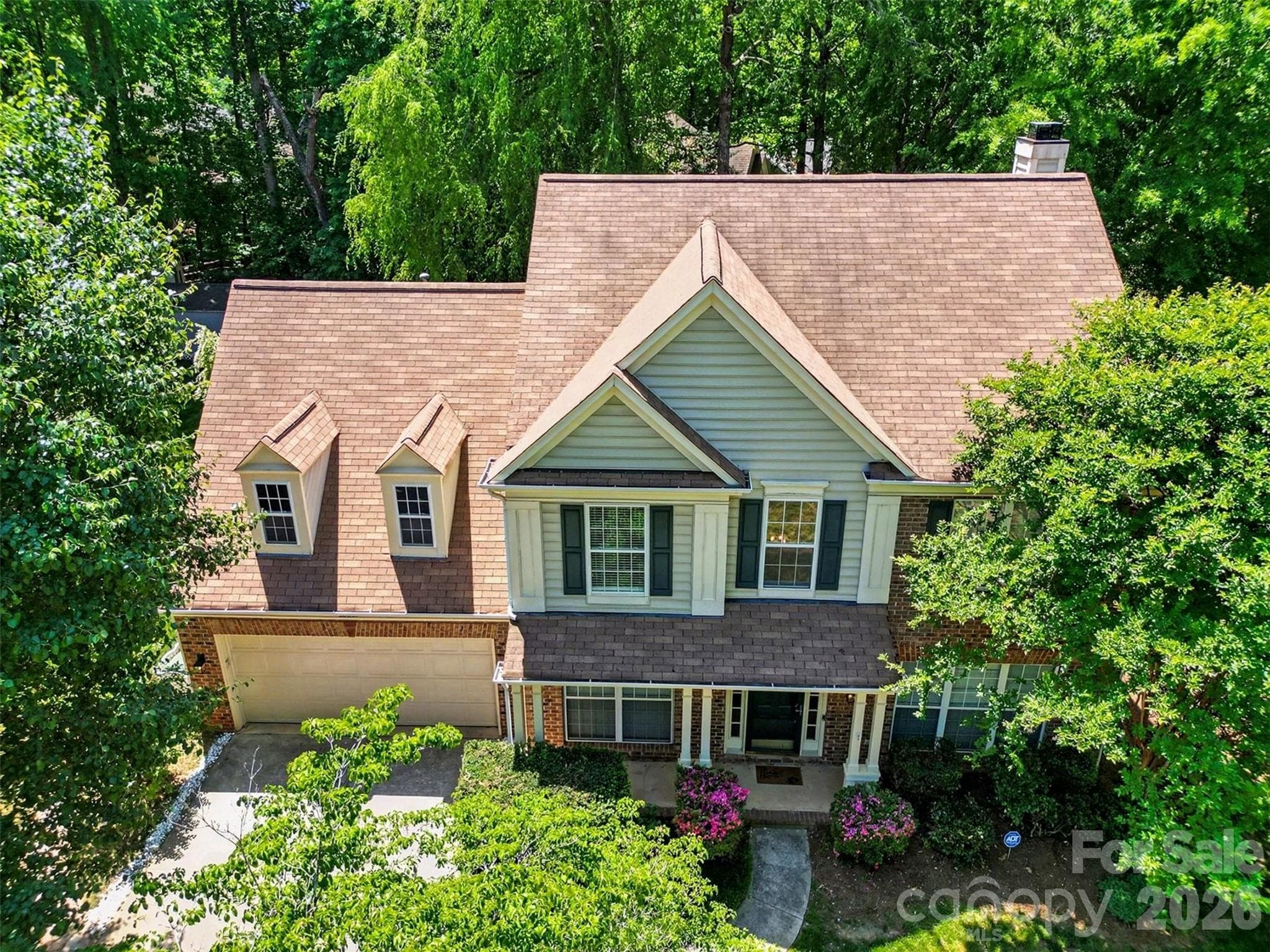 THIS PHOTO IS OLD. Roof was replaced in September 2026 - 15817 Prestwoods Lane, Huntersville