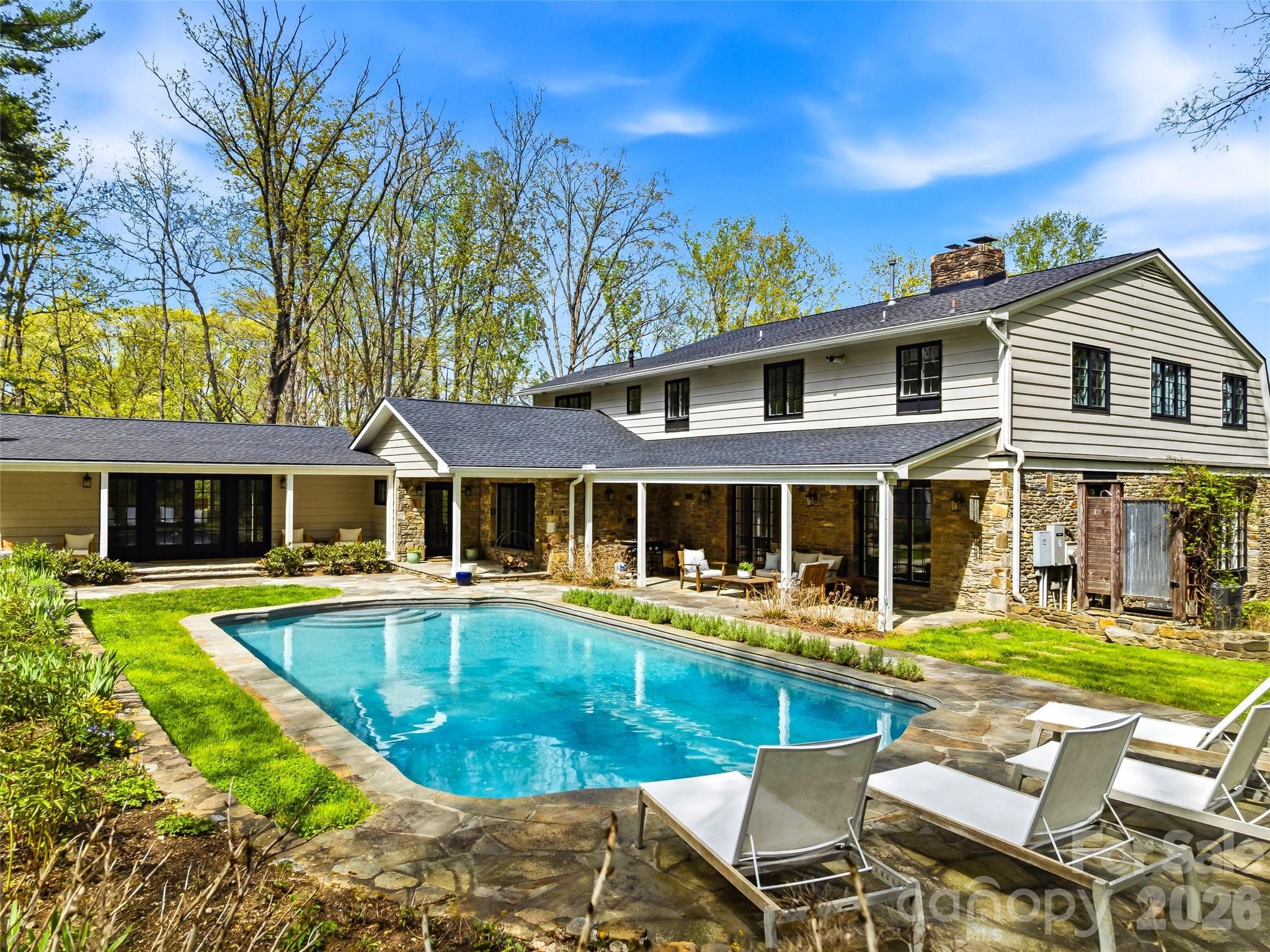 Beautifully restored gunite pool with stone surround and professionally landscaped. You'll be surrounded with blooms from spring to fall. - 10 Kalimar Heights, Hendersonville