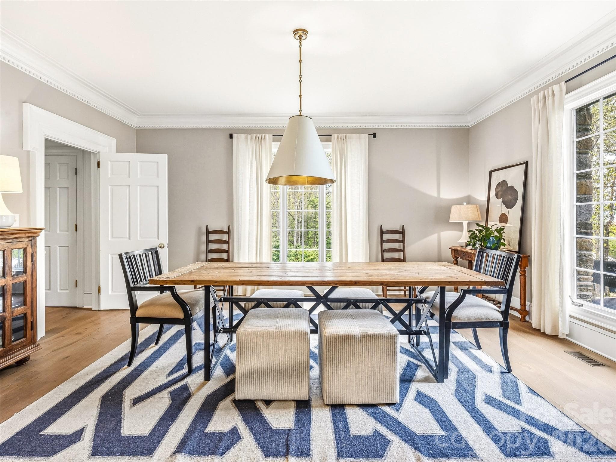 Light filled dining room with plenty of space for guests and entertaining. - 10 Kalimar Heights, Hendersonville