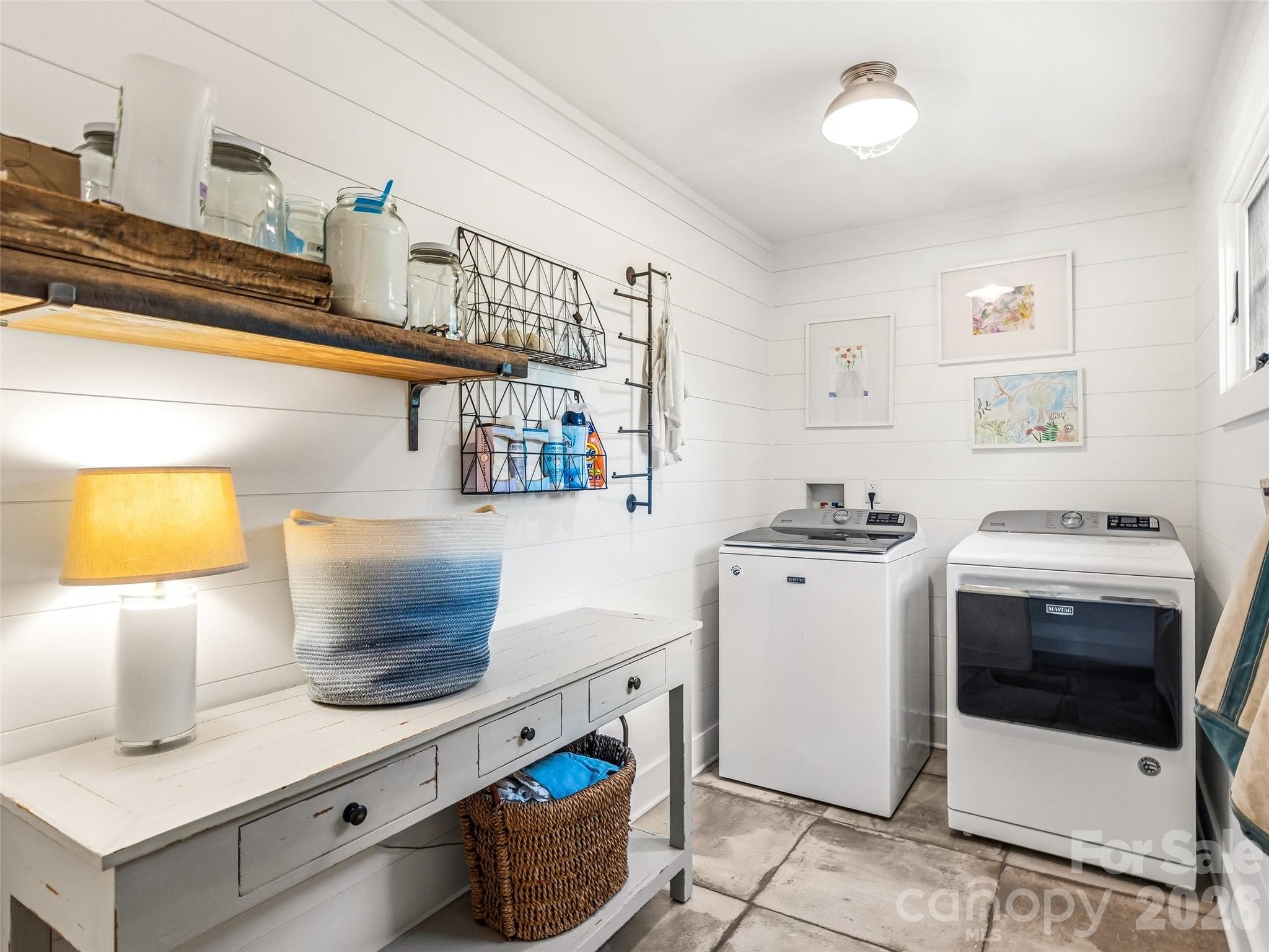 Conveniently located laundry room on the main level off of the mudroom. - 10 Kalimar Heights, Hendersonville