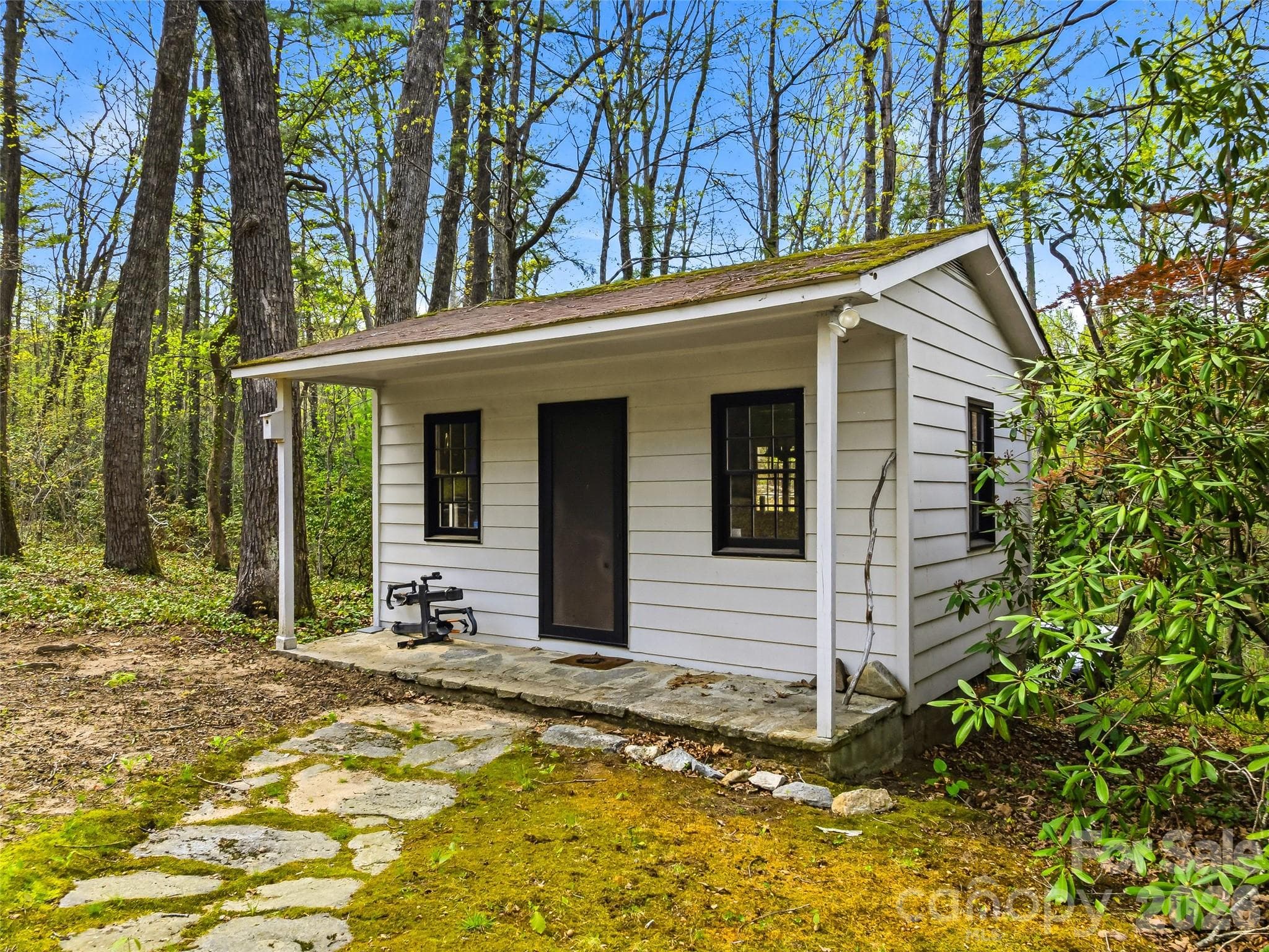 Versatile detached outbuilding, presently a workout studio, easily suited for a home office, studio, or quiet escape. - 10 Kalimar Heights, Hendersonville